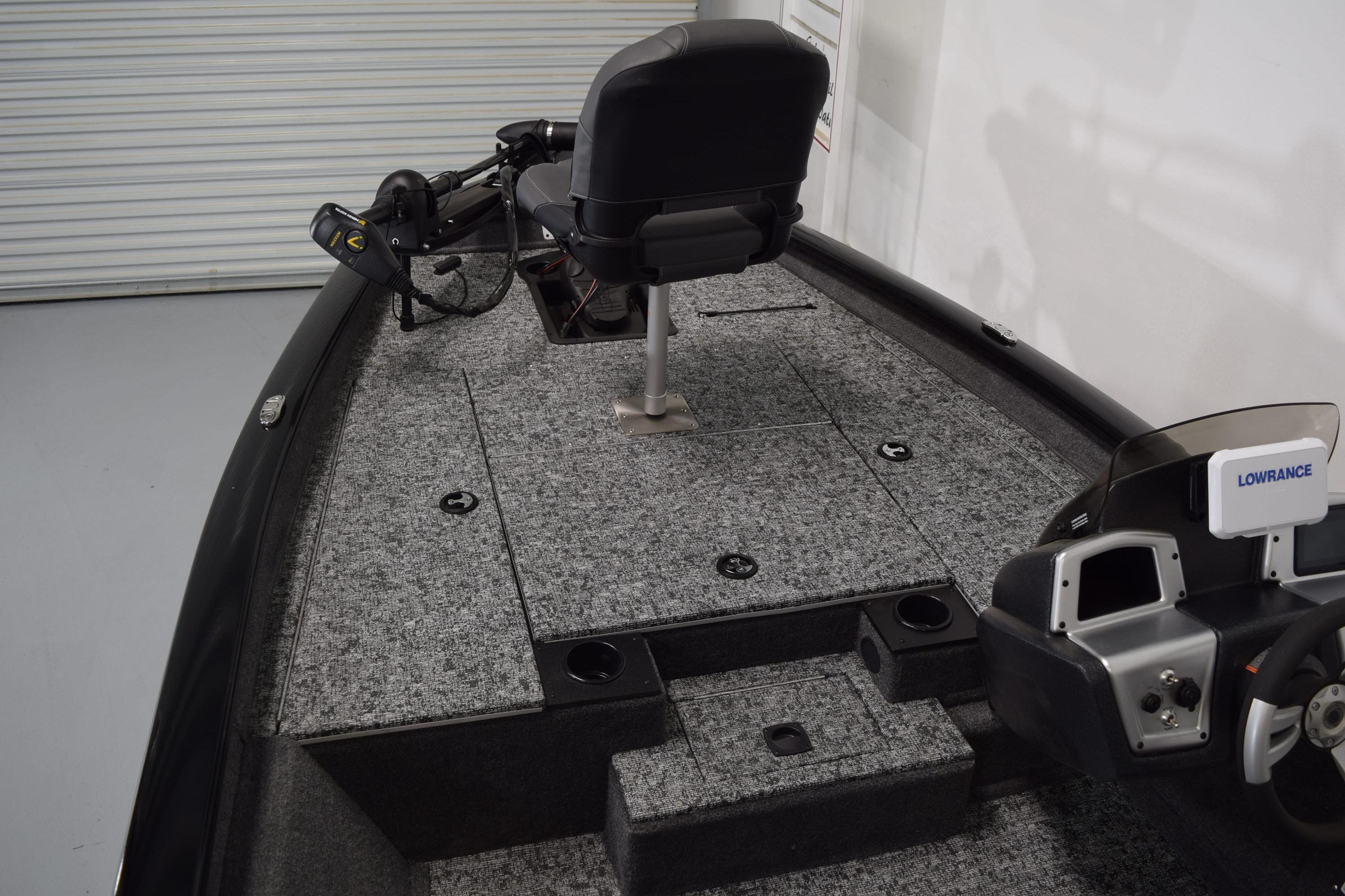 2026 Tracker Pro Team 175 boat interior with seating and control panel.