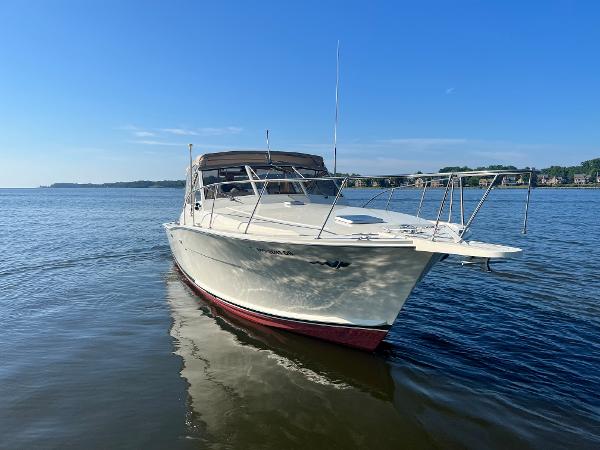 1985 Viking 35 Express on calm water.
