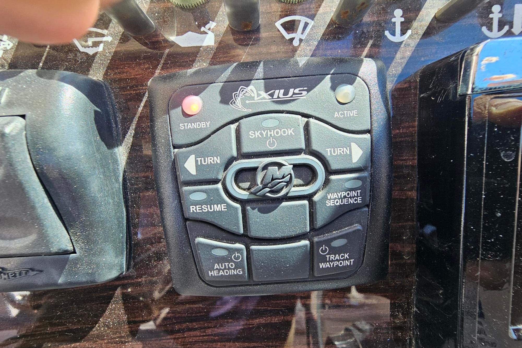 Control panel of a 2016 Sea Ray Sundancer 350 boat with Axius system.