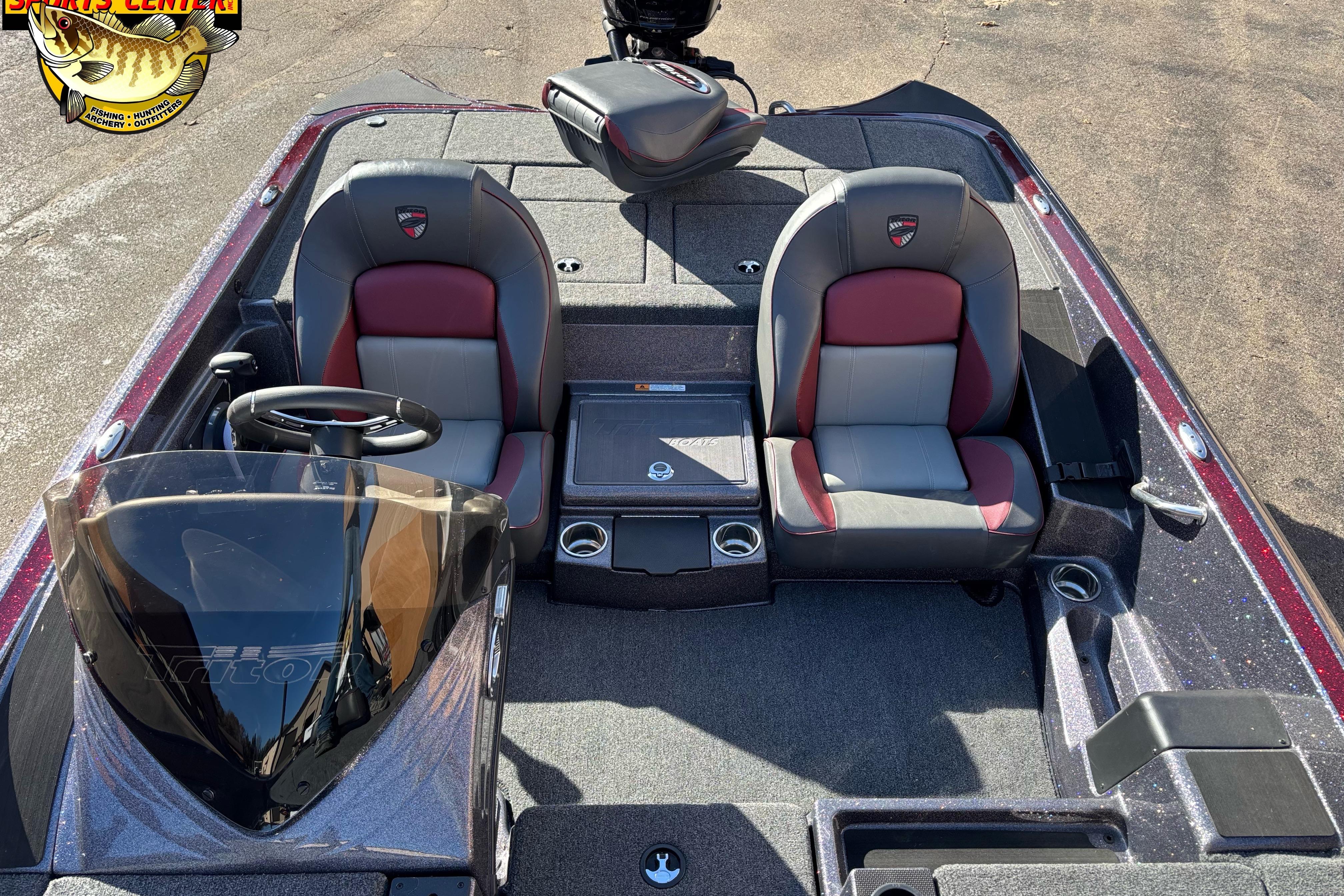 2025 Triton 18 TrX boat interior with dual seats and steering console.