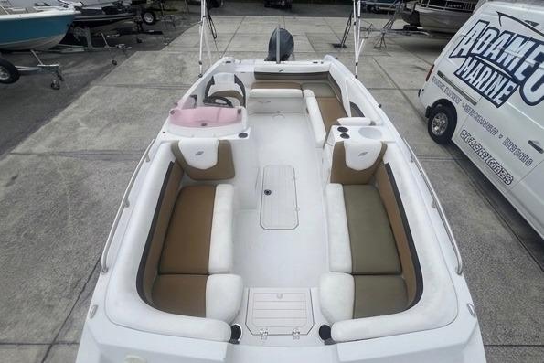 2021 Starcraft SVX 211 OB boat with spacious seating and modern design.