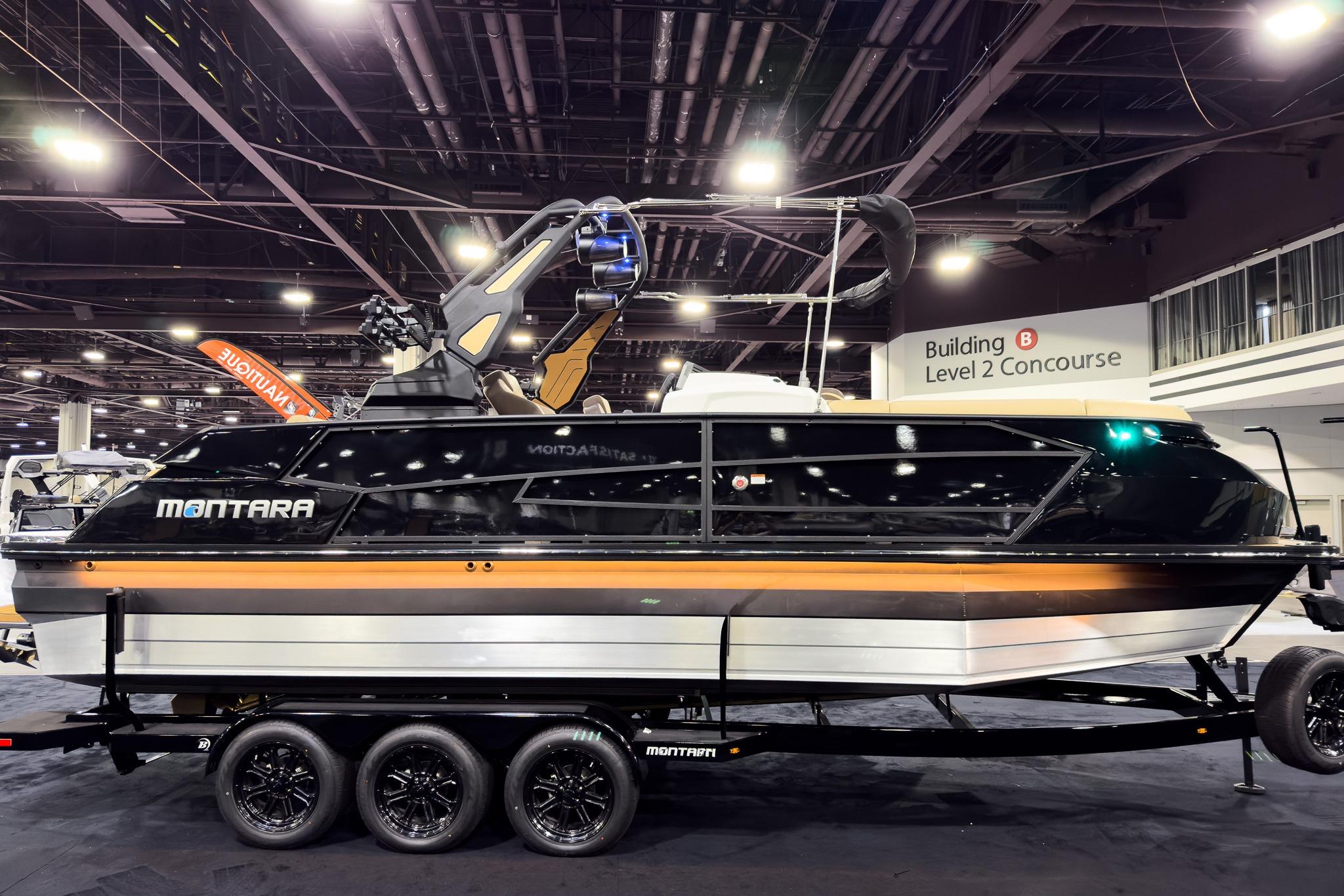 2026 Montara Surf Boss EVO SLDH 25' boat displayed indoors on a trailer.