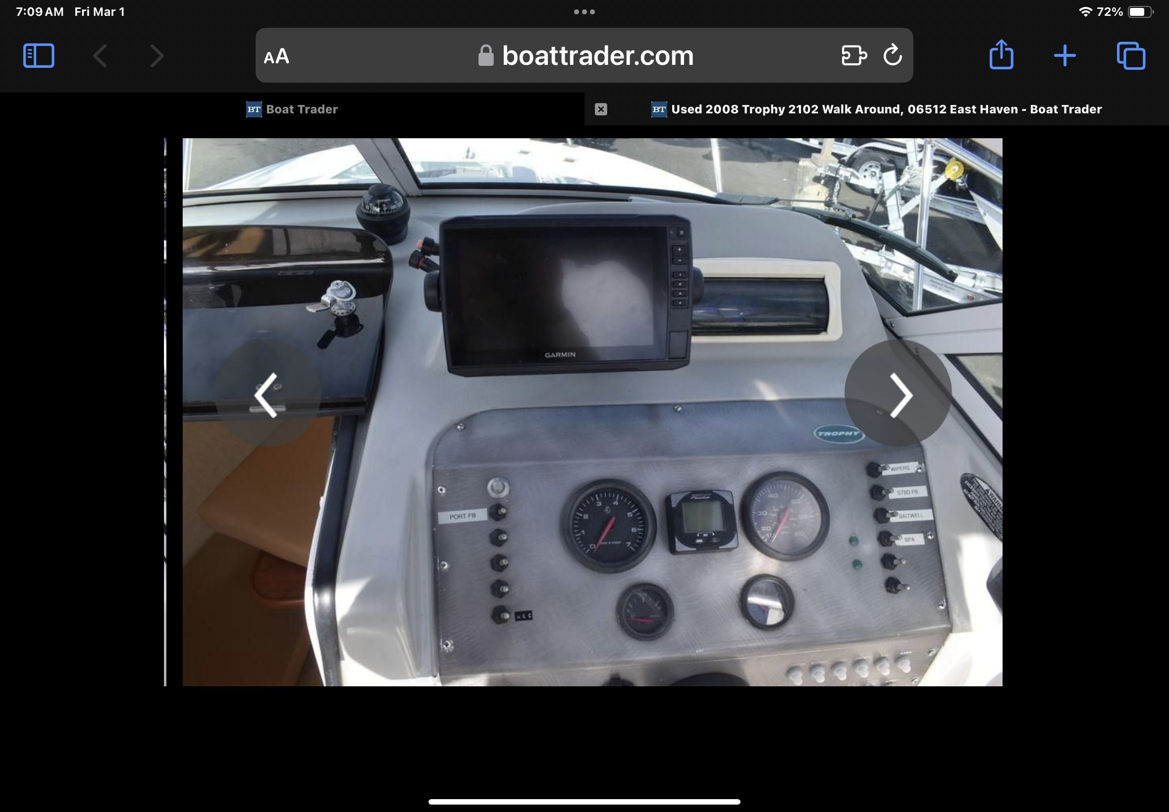 Dashboard of a 2008 Trophy 22 WA boat with Garmin navigation system.