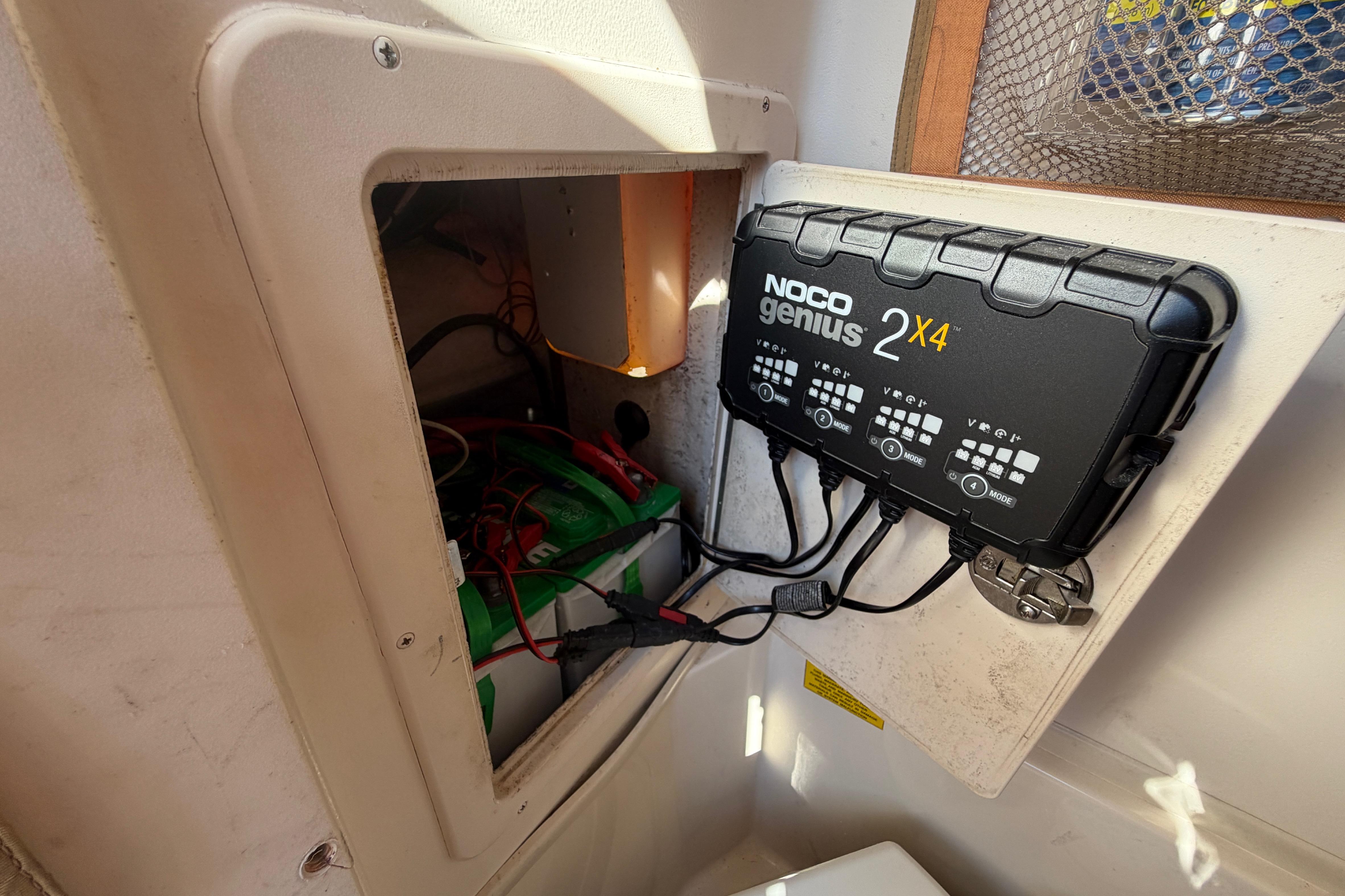 NOCO Genius 2X4 charger in 2004 Grady White 273 boat compartment.