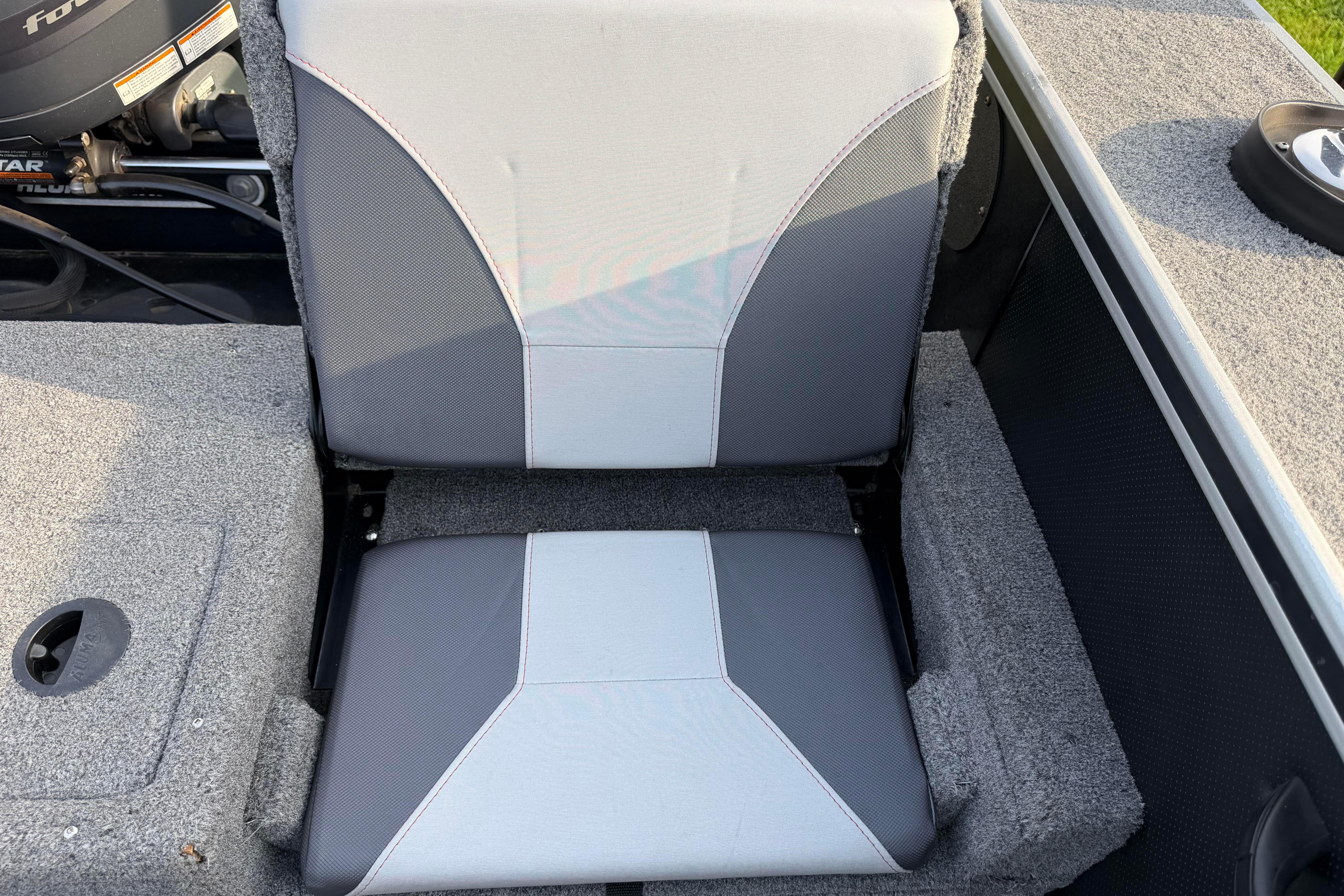 2019 Alumacraft Trophy 205 boat seat with gray and white upholstery.
