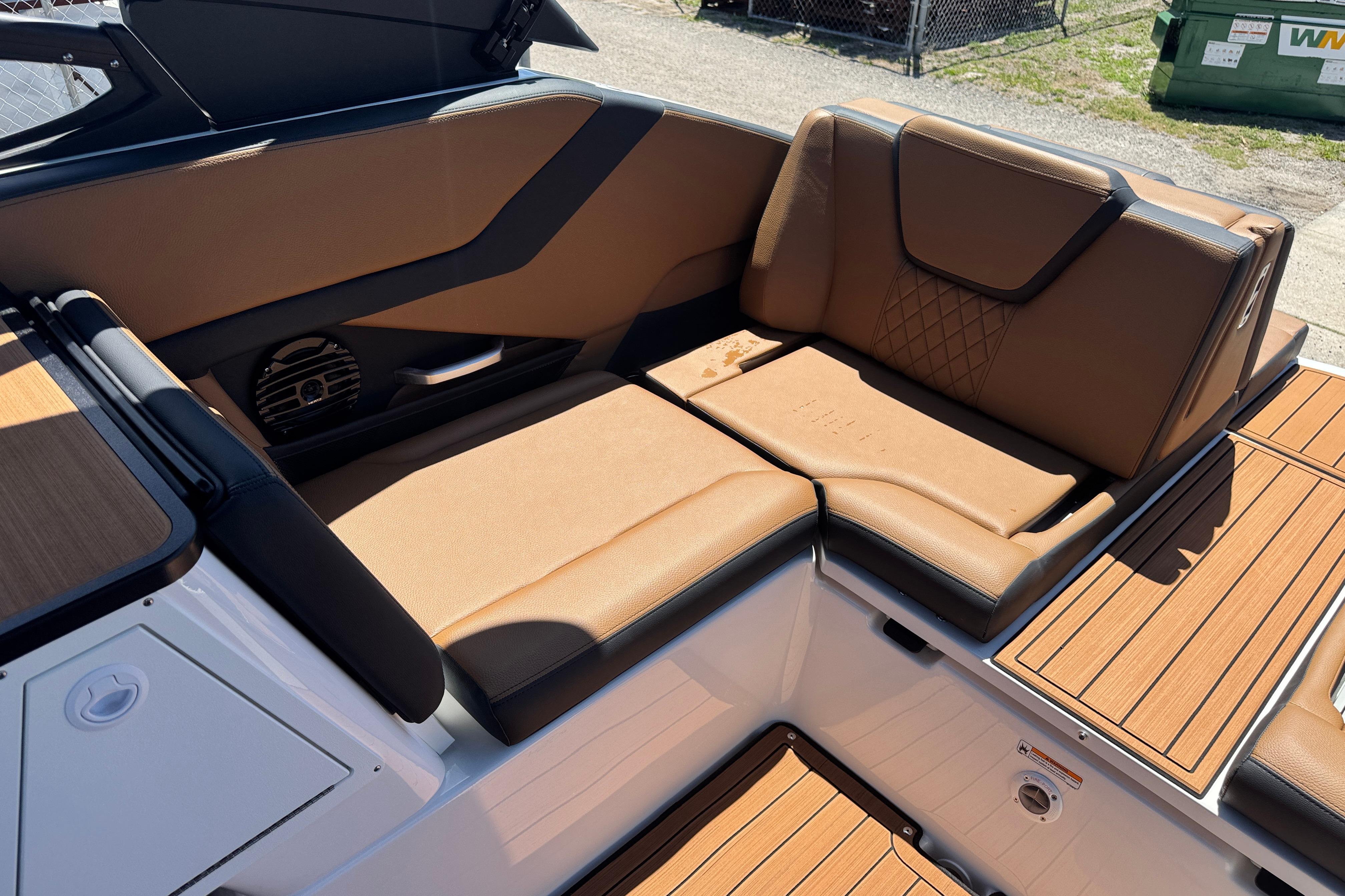 Luxurious seating on 2026 Yamaha Boats 252SD, featuring premium brown upholstery and sleek design.