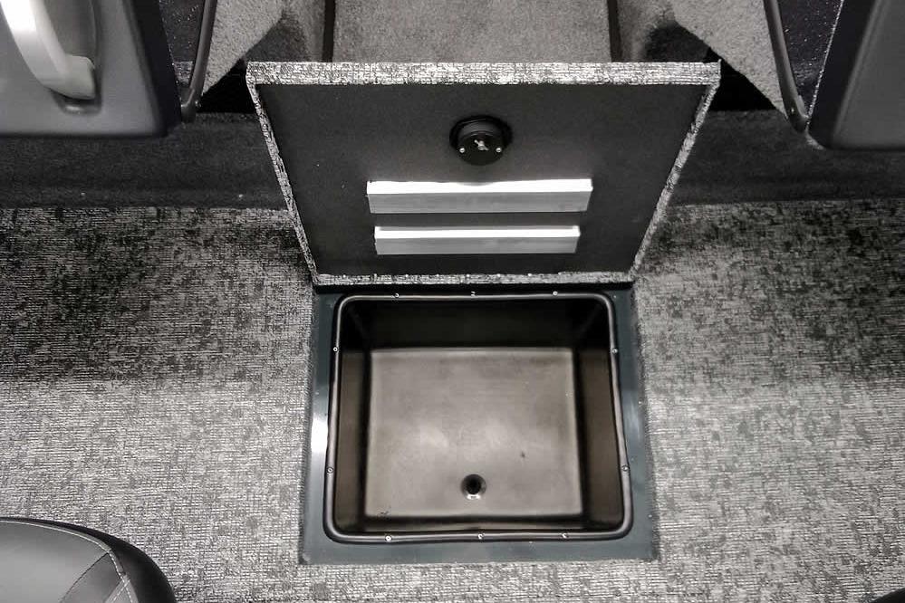 2026 Ranger VX1888 WT boat storage compartment with open lid, showcasing interior space.