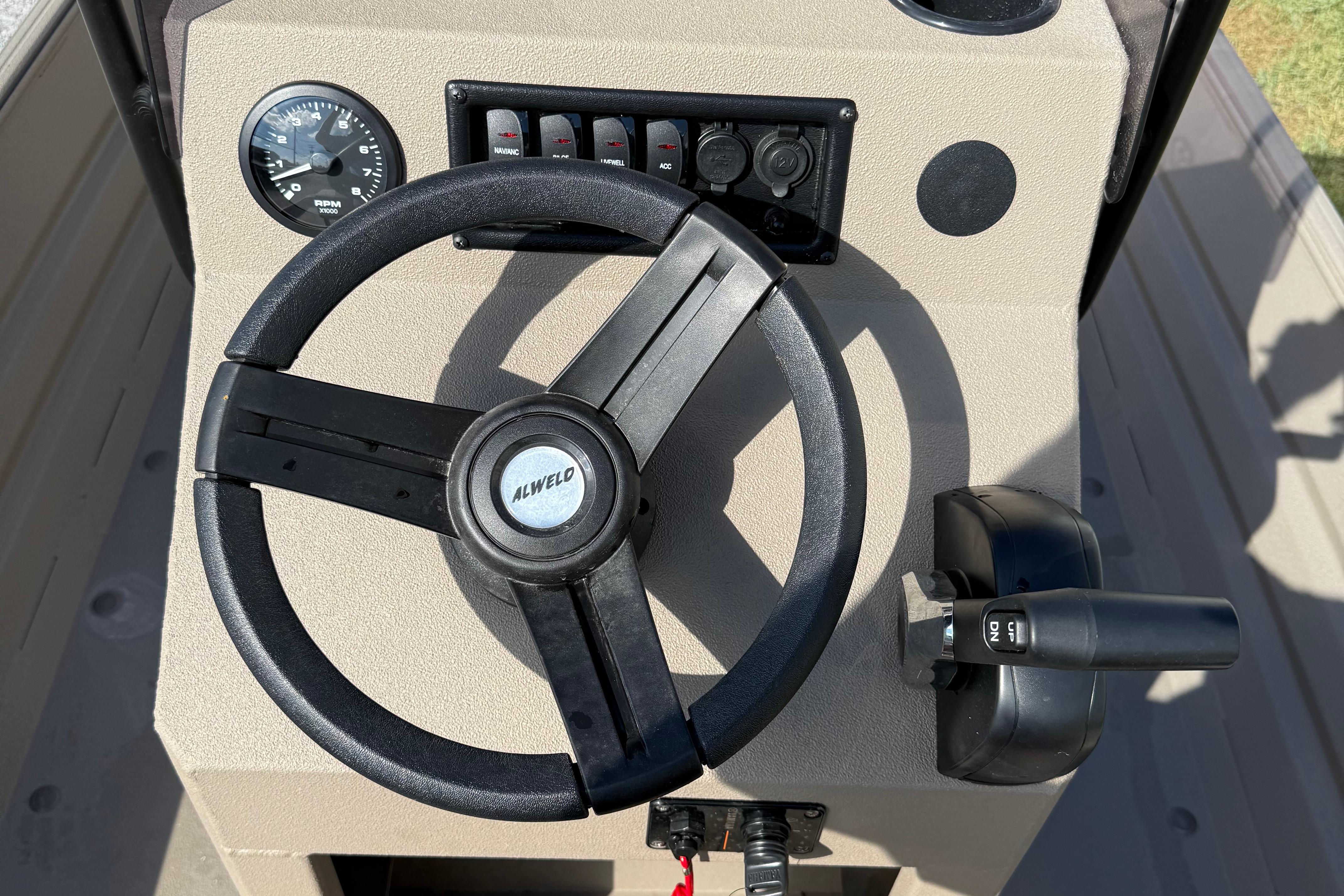 2025 Alweld 1756 V MARSH C.C. boat steering console with controls and gauges.
