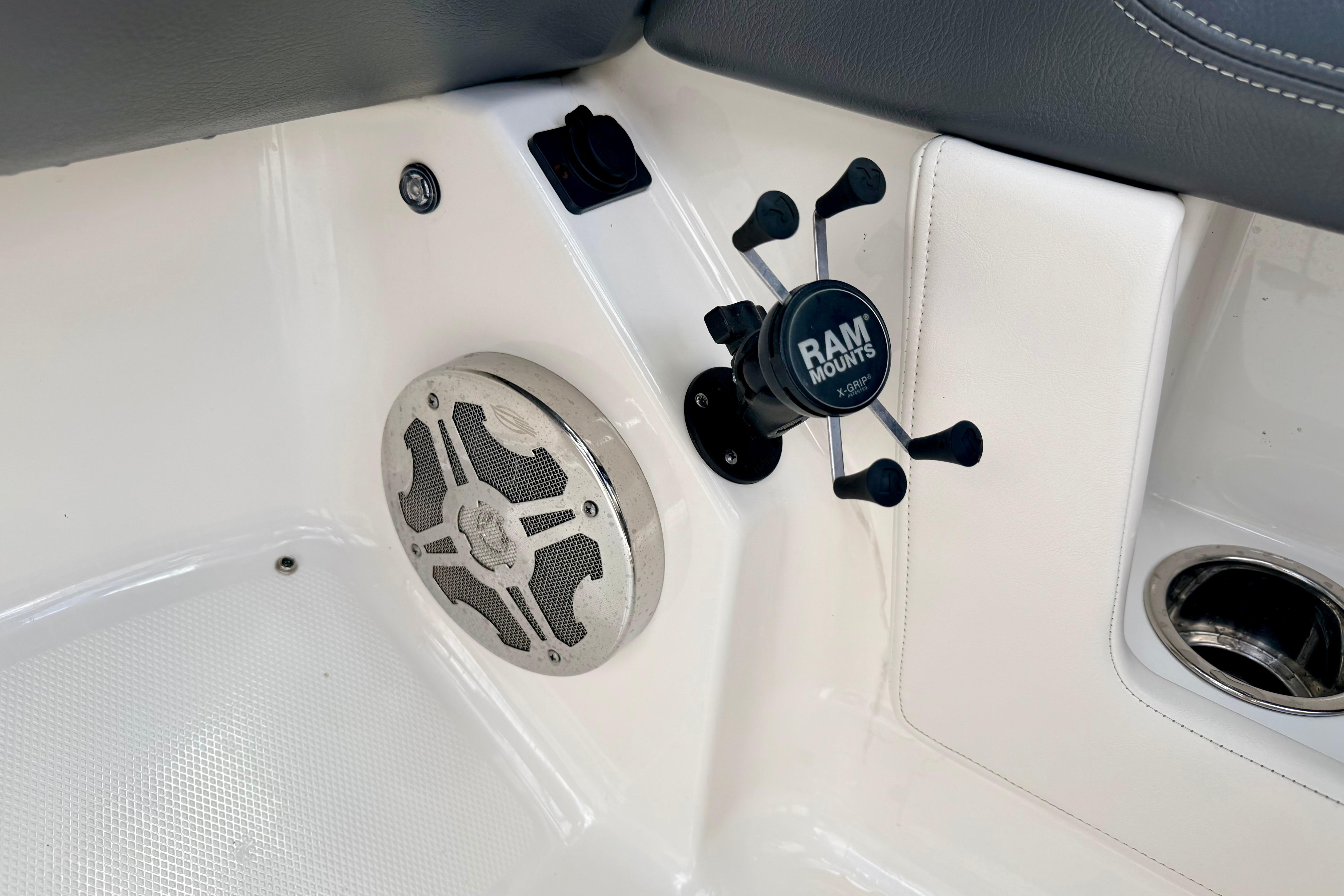 Interior of 2015 Chaparral Sunesta 264 with RAM mount and speaker.