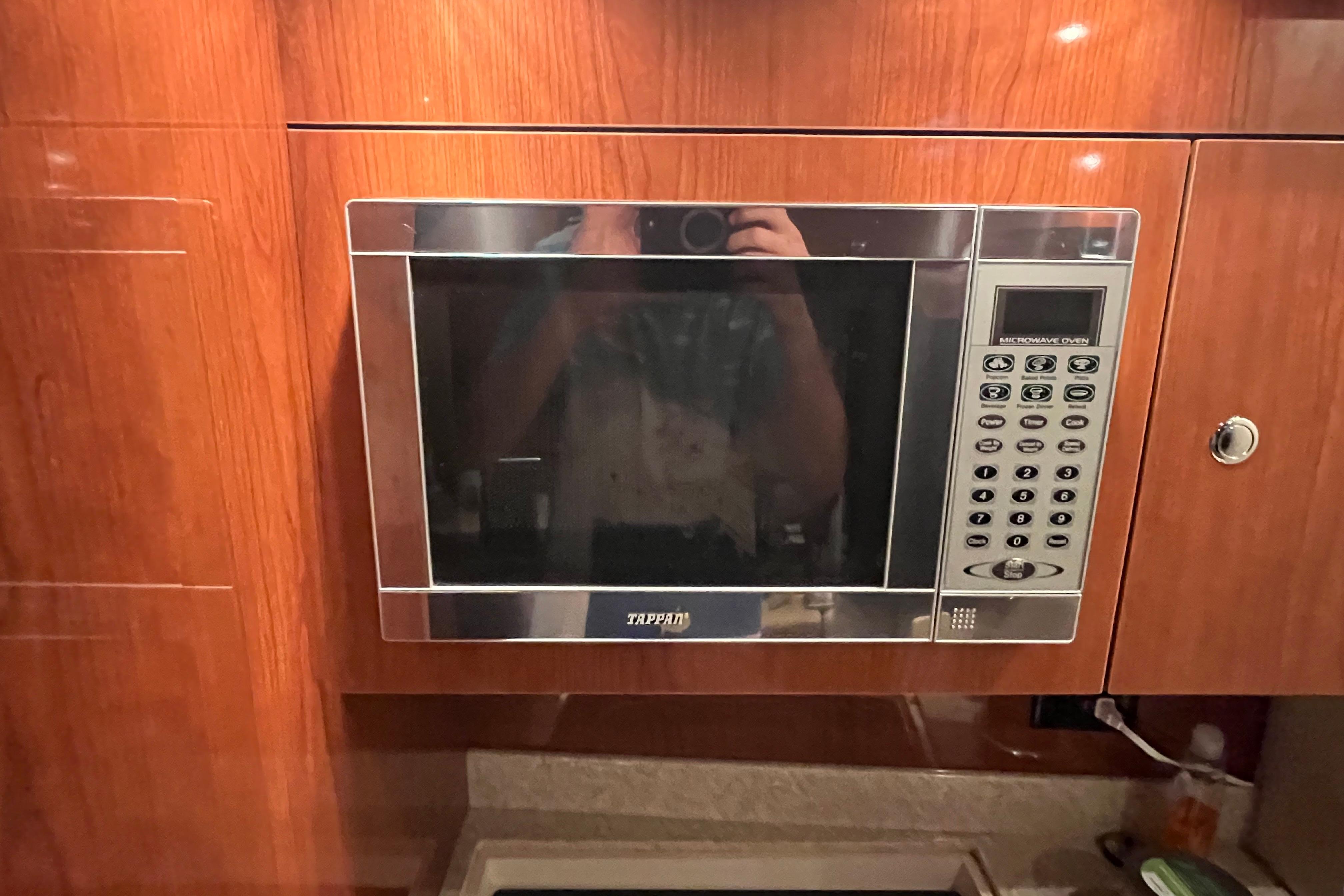 Built-in microwave in 2007 Regal 3760 IB COMMODORE yacht kitchen.