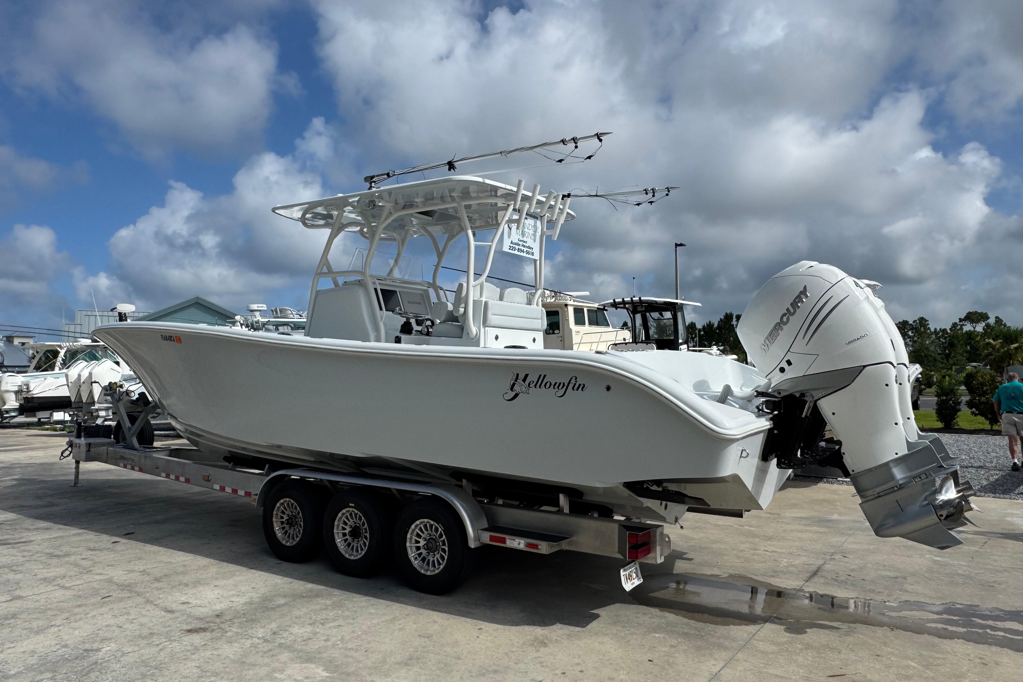 2022 Yellowfin 32 Offshore boat on trailer with Mercury outboard engines.