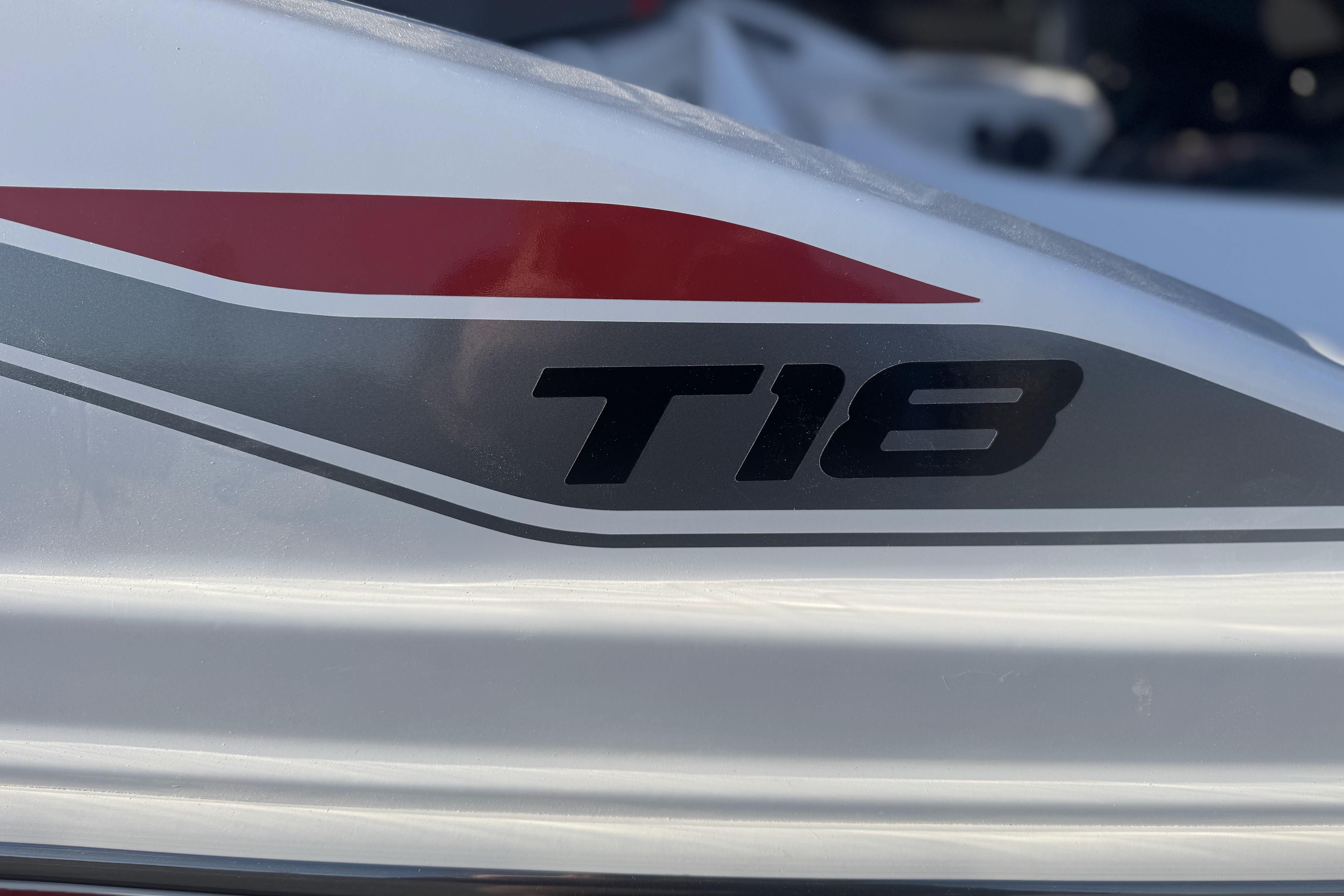 2026 Tahoe T18 boat decal with red and gray accents.