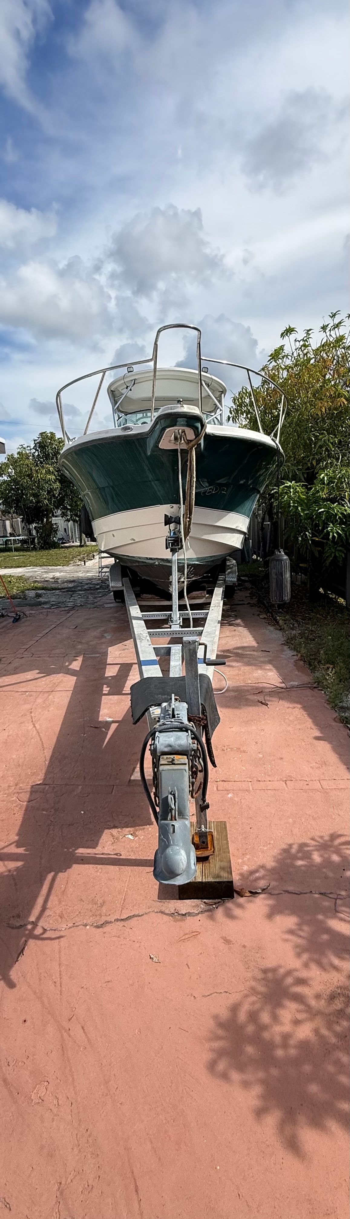 2005 Trophy 2902 Walkaround boat on trailer, side view.