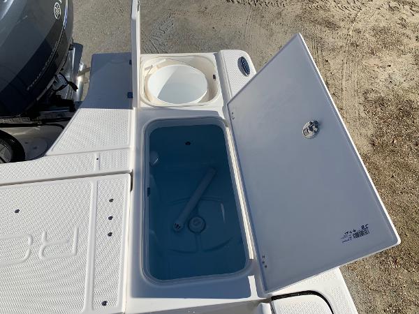 2024 Robalo 226 Cayman boat storage compartments and livewell.
