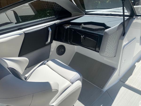 2025 Scarab 235 SE boat interior with modern seating and sleek dashboard design.