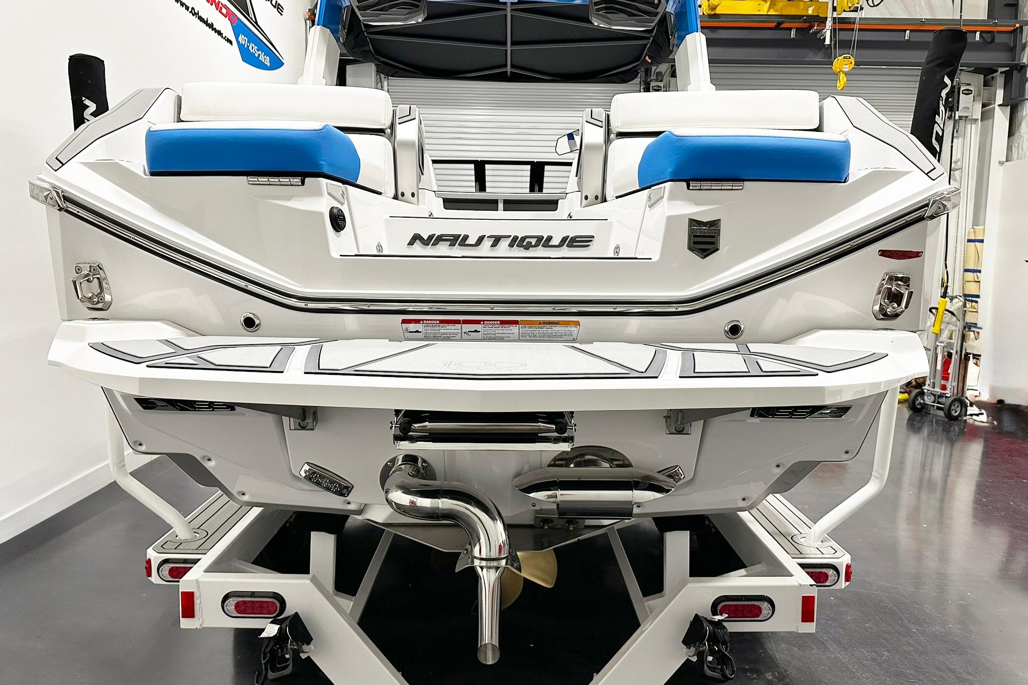 2025 Nautique Super Air Nautique G23 Paragon boat rear view in showroom.