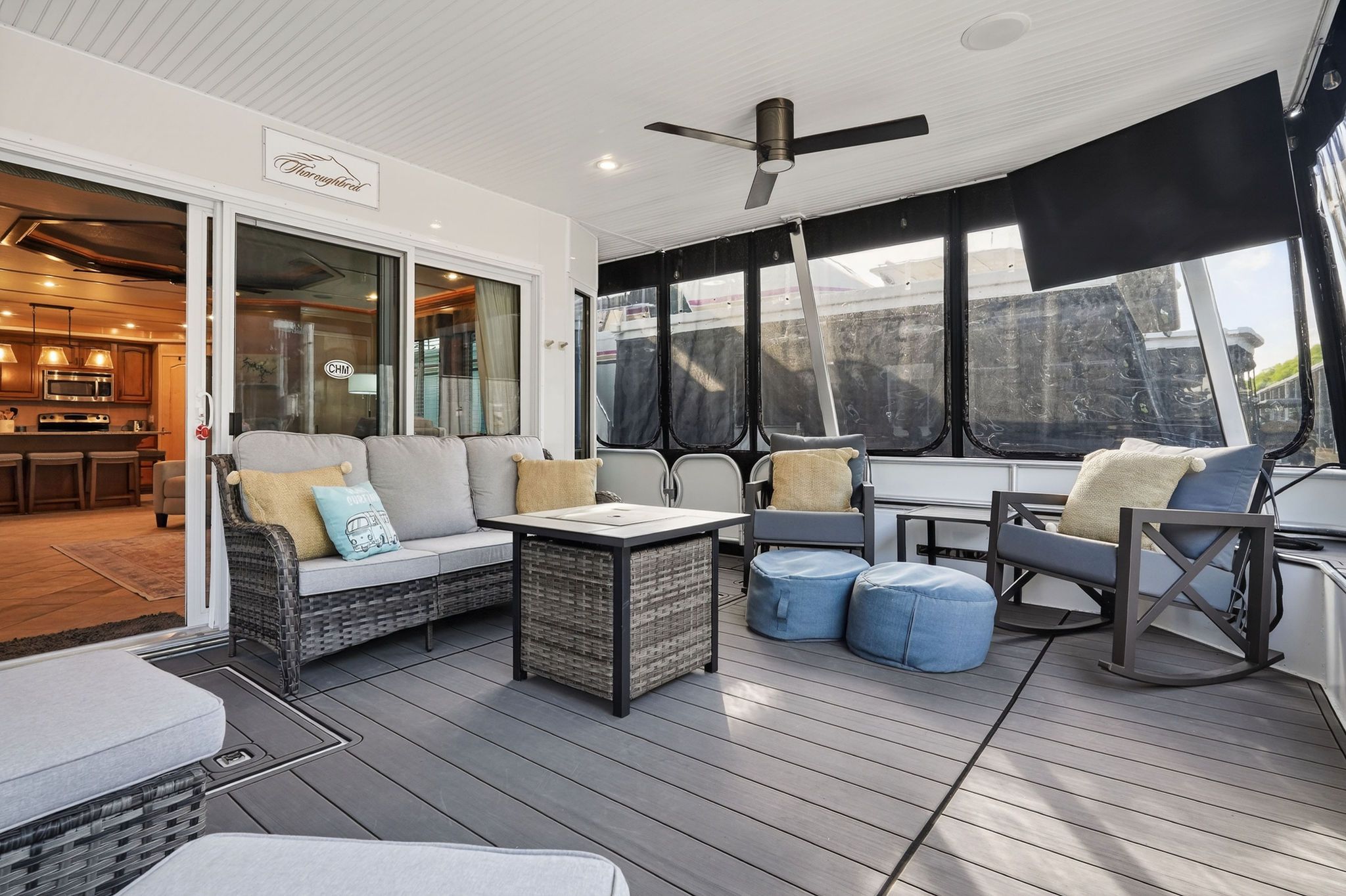 Modern houseboat interior with cozy seating area, built in 2010.