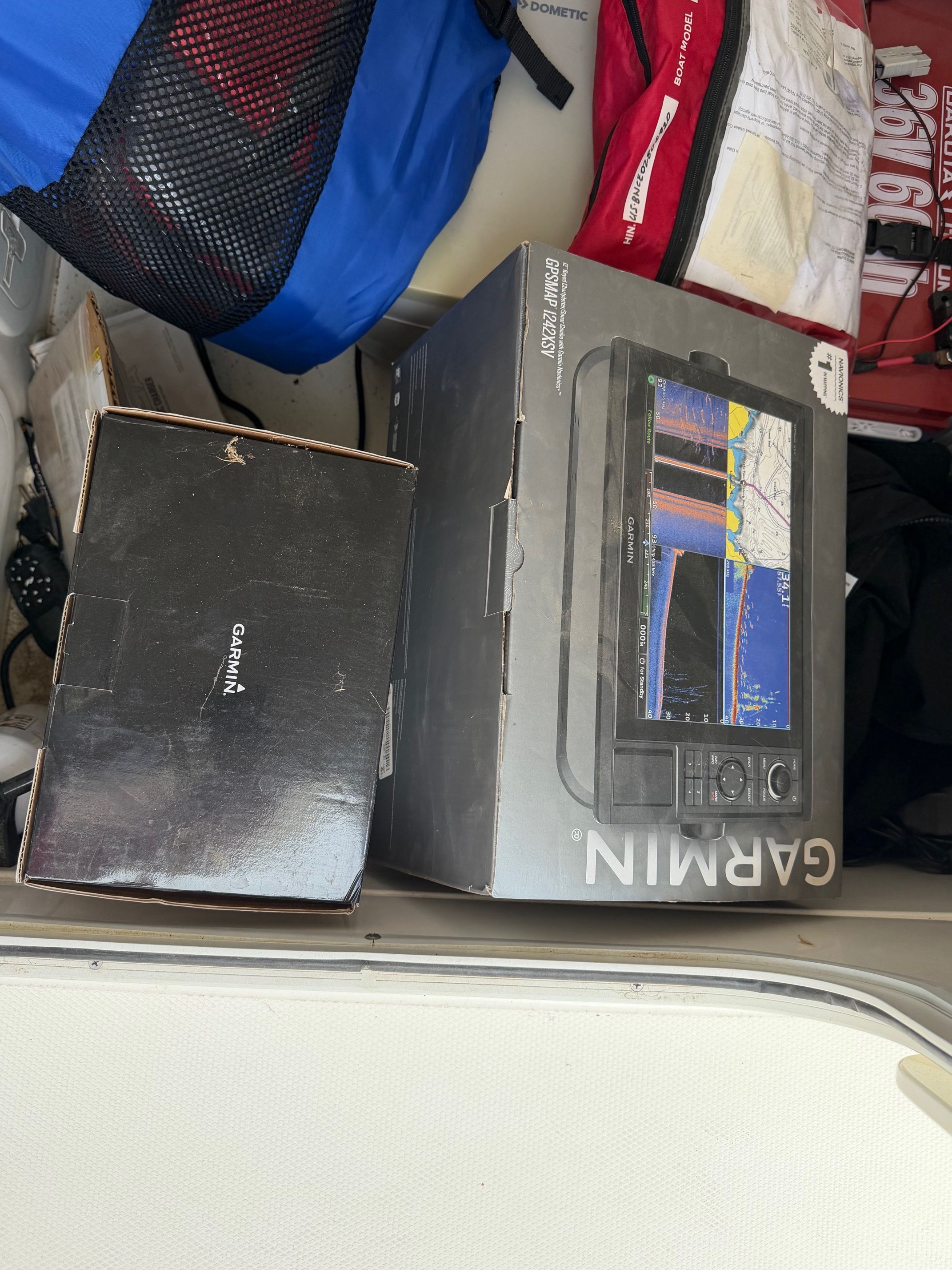 Garmin electronics boxes on a Boston Whaler 230 Outrage boat.