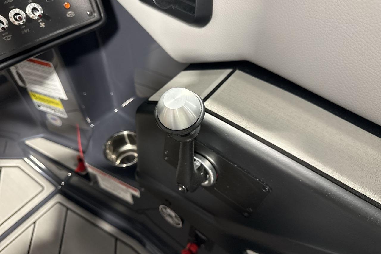 Close-up of a control lever on a 2026 Moomba Craz boat.