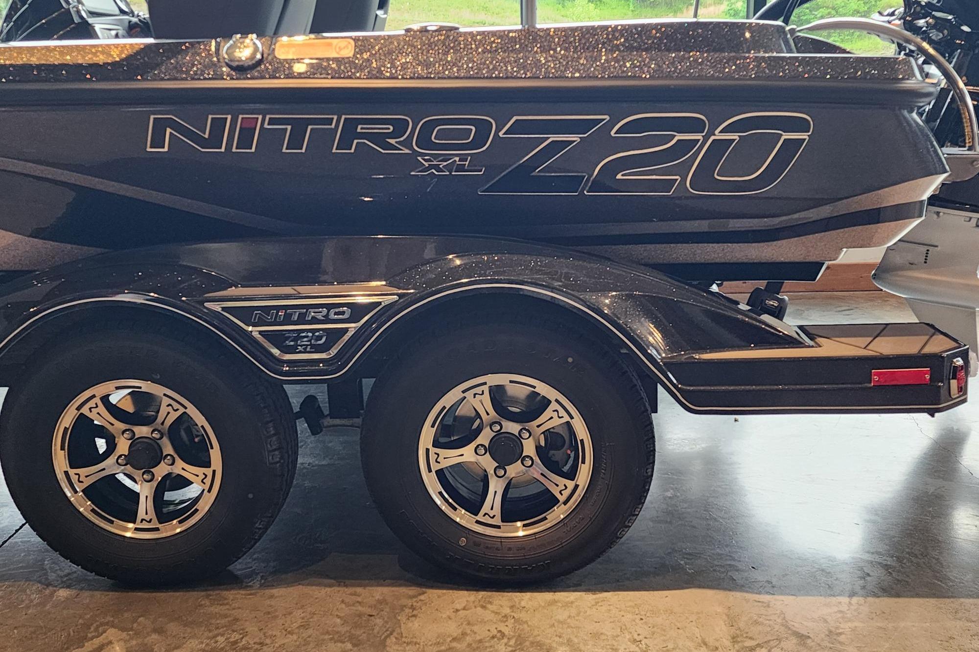 2026 Nitro Z20 XL boat trailer with dual wheels, displayed indoors.