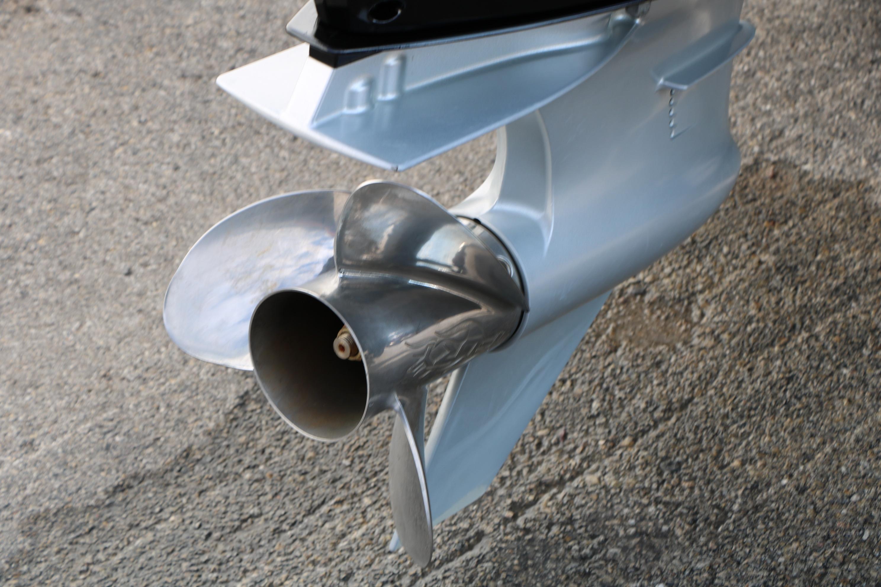 Propeller of 2022 Vexus VX21 boat on pavement background.