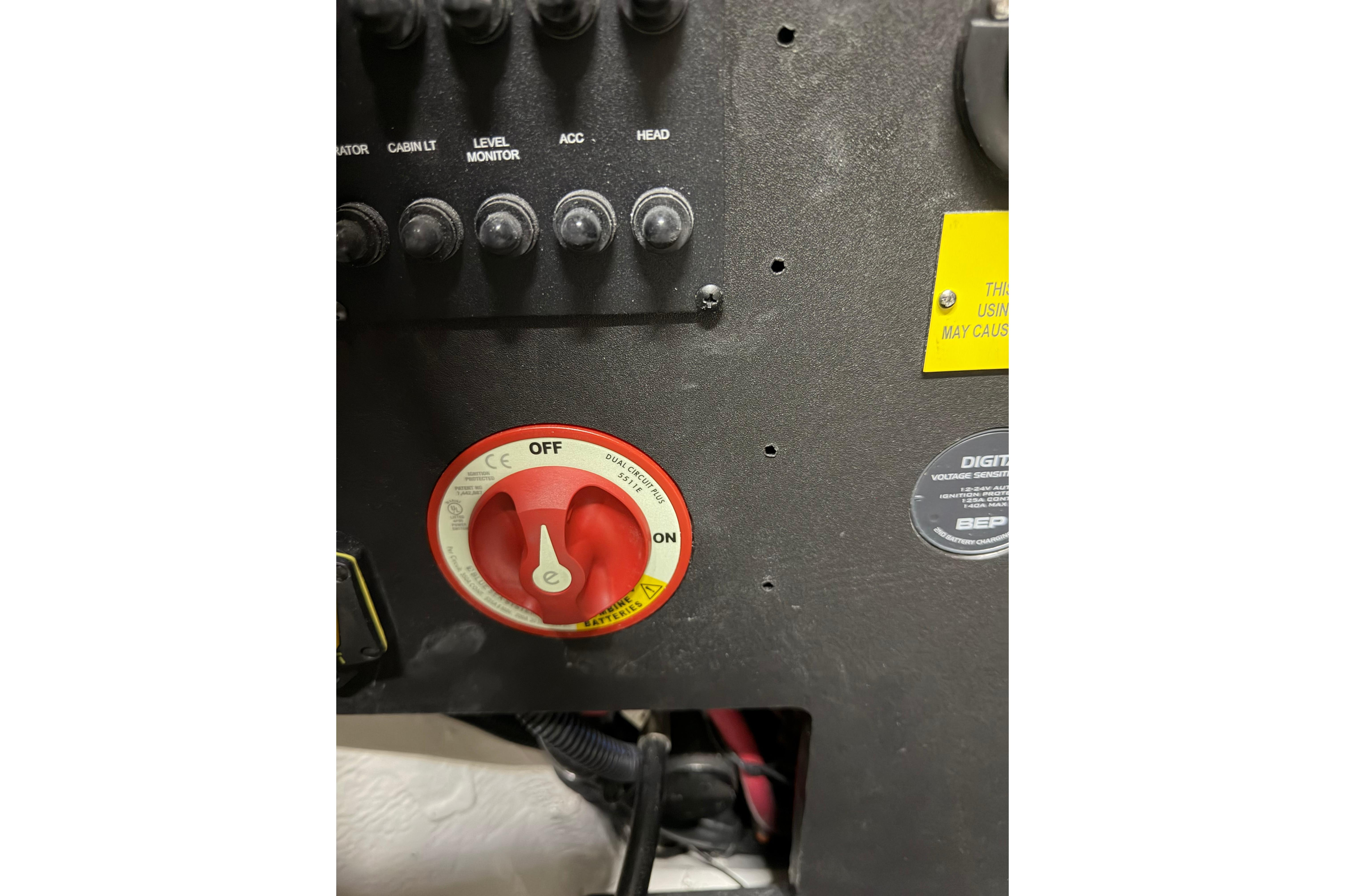 Control panel with switches and a red power dial on a 2026 Regal LS6.