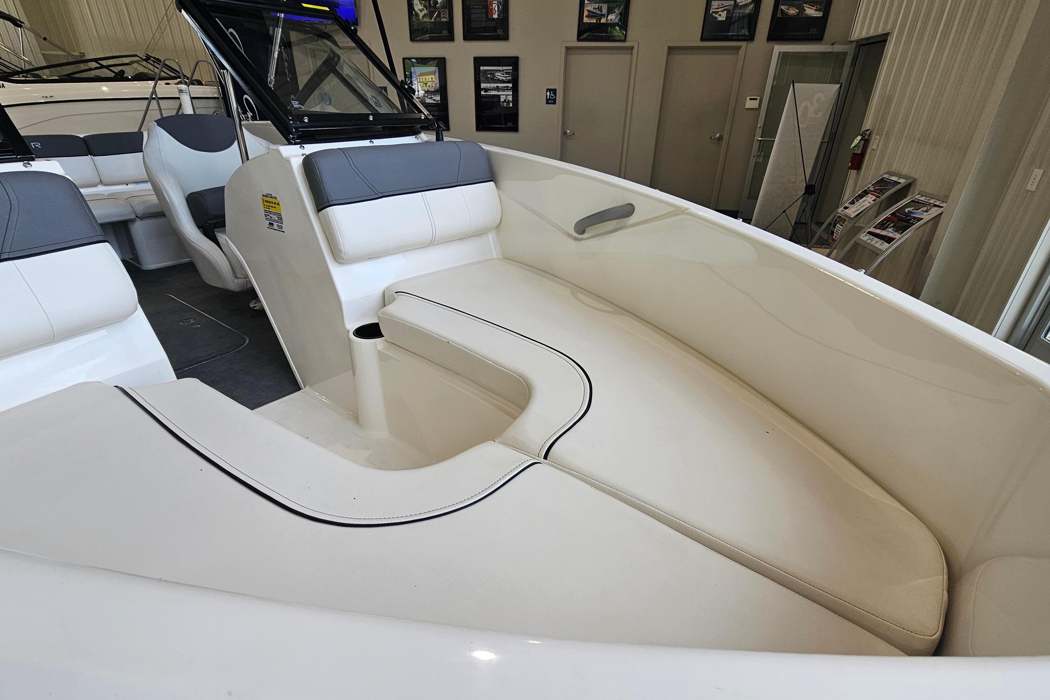 2019 Bayliner 170 Bowrider interior with white seating and modern design.