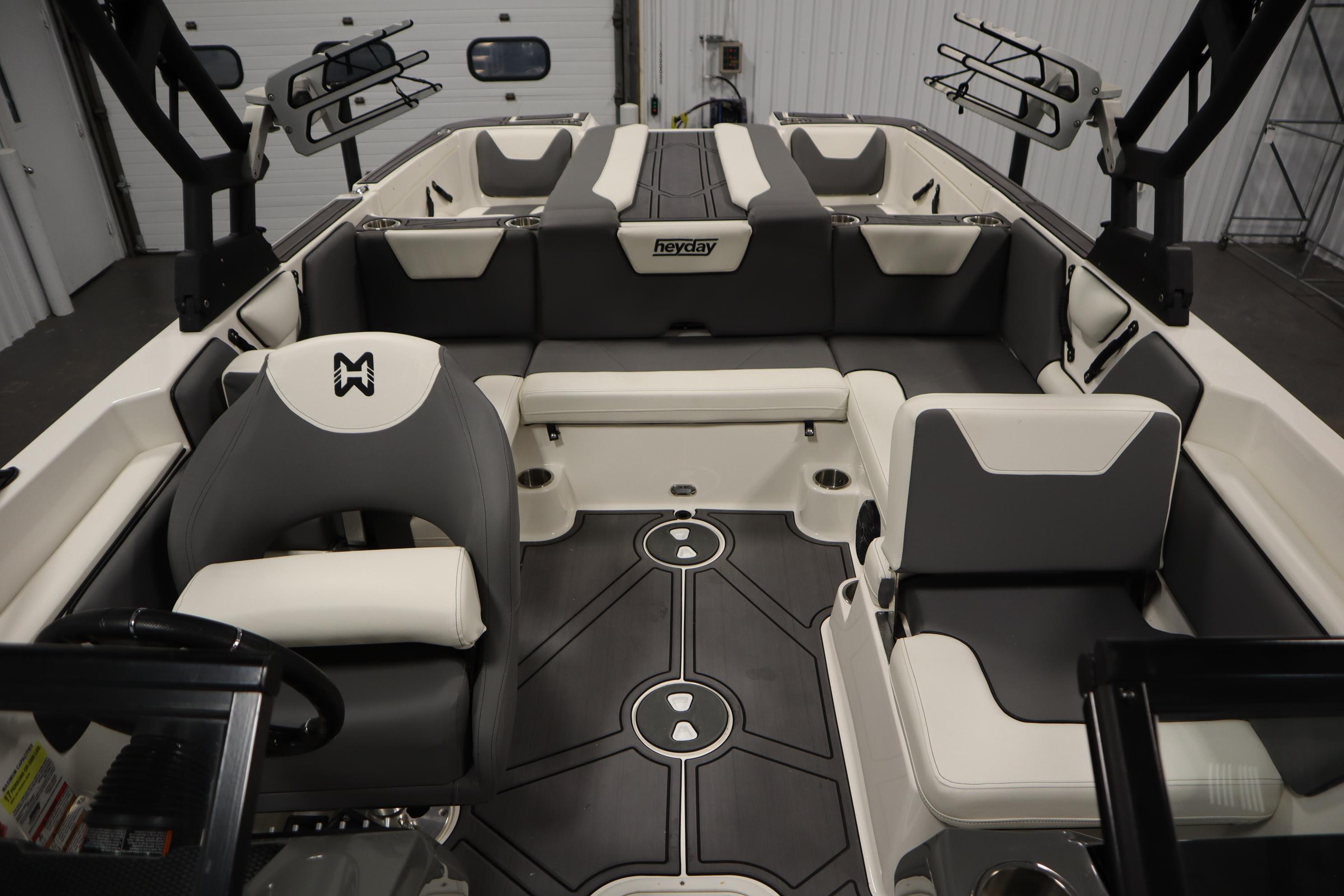 2023 Heyday WT Surf boat interior with modern seating and sleek design.