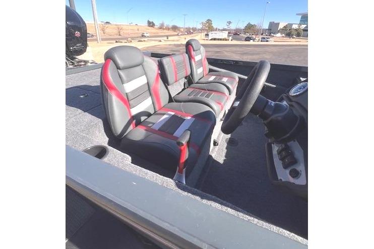 2026 Ranger RT188P boat interior with gray and red seats under clear blue sky.
