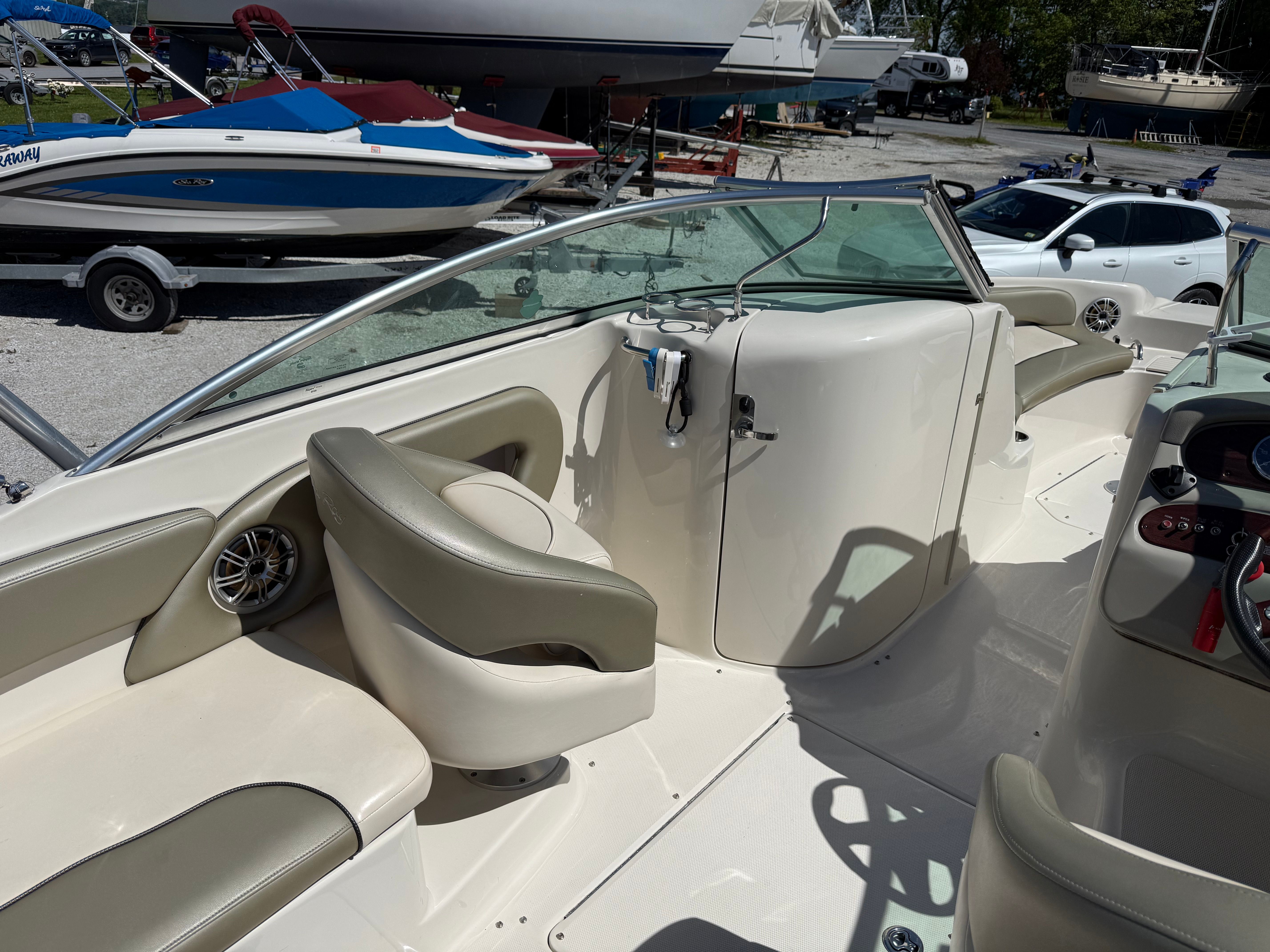 Interior of a 2005 Sea Ray 240 Sundeck boat at the marina.