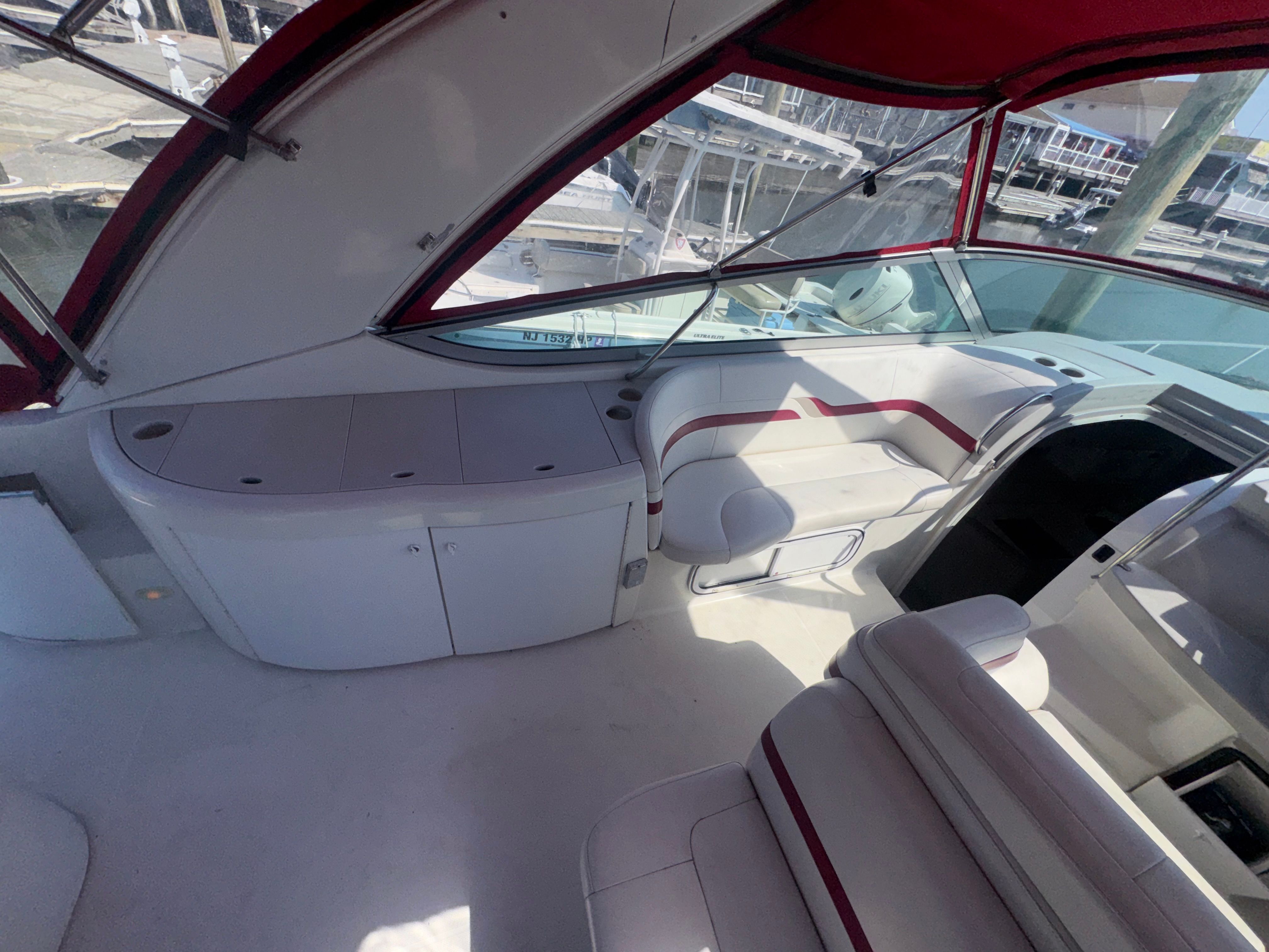 Interior of a 2001 Formula 37 SUPER SPORT yacht with red accents.
