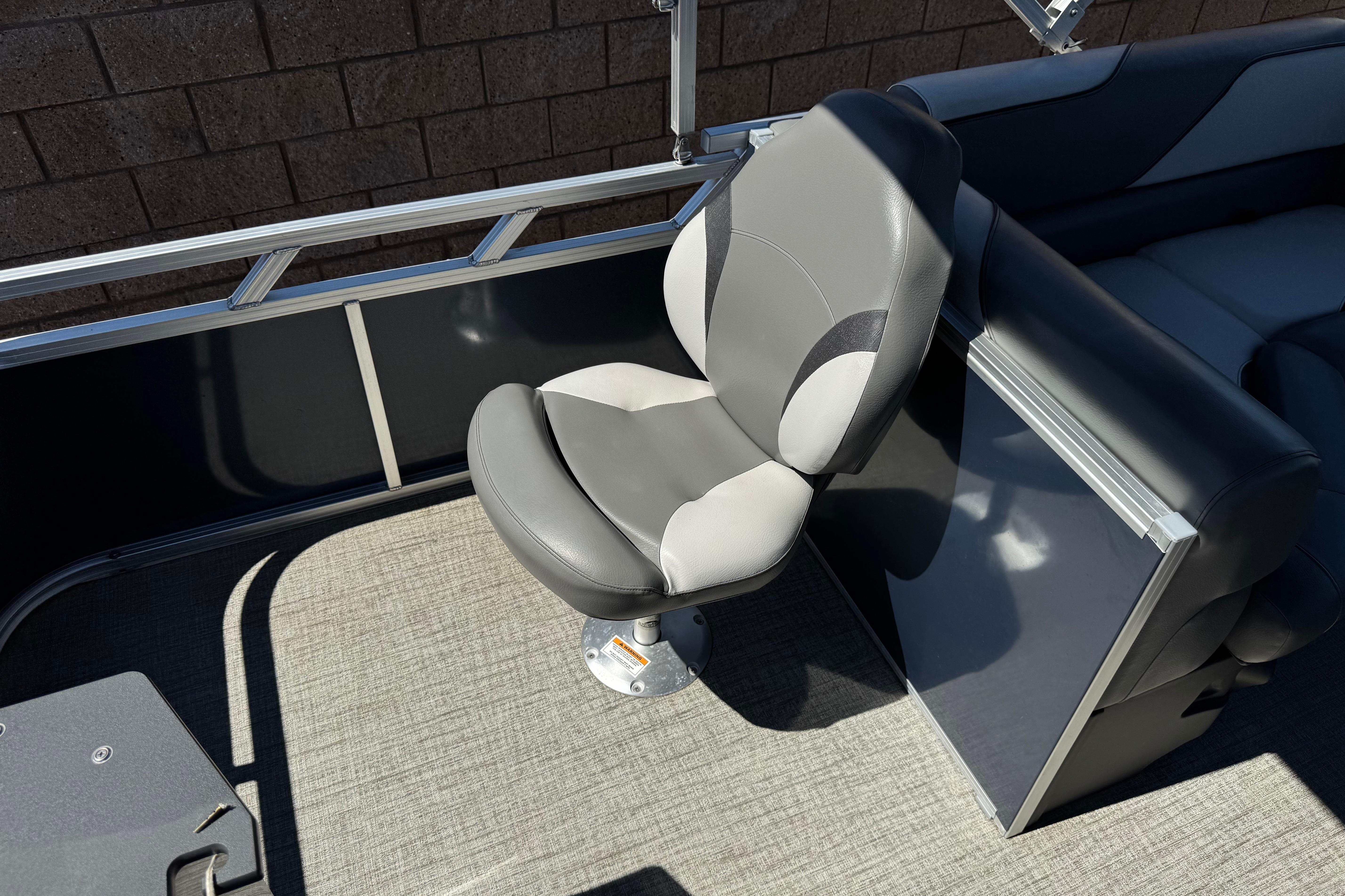 2023 Avalon Venture Fish N Cruise boat seat with gray upholstery and sleek design.