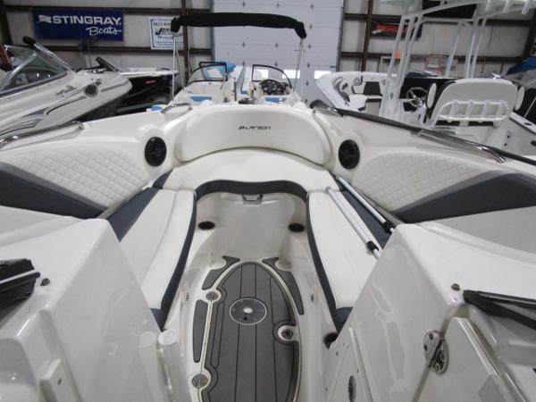 2017 Larson 292 LXI boat interior with white seating and modern design.