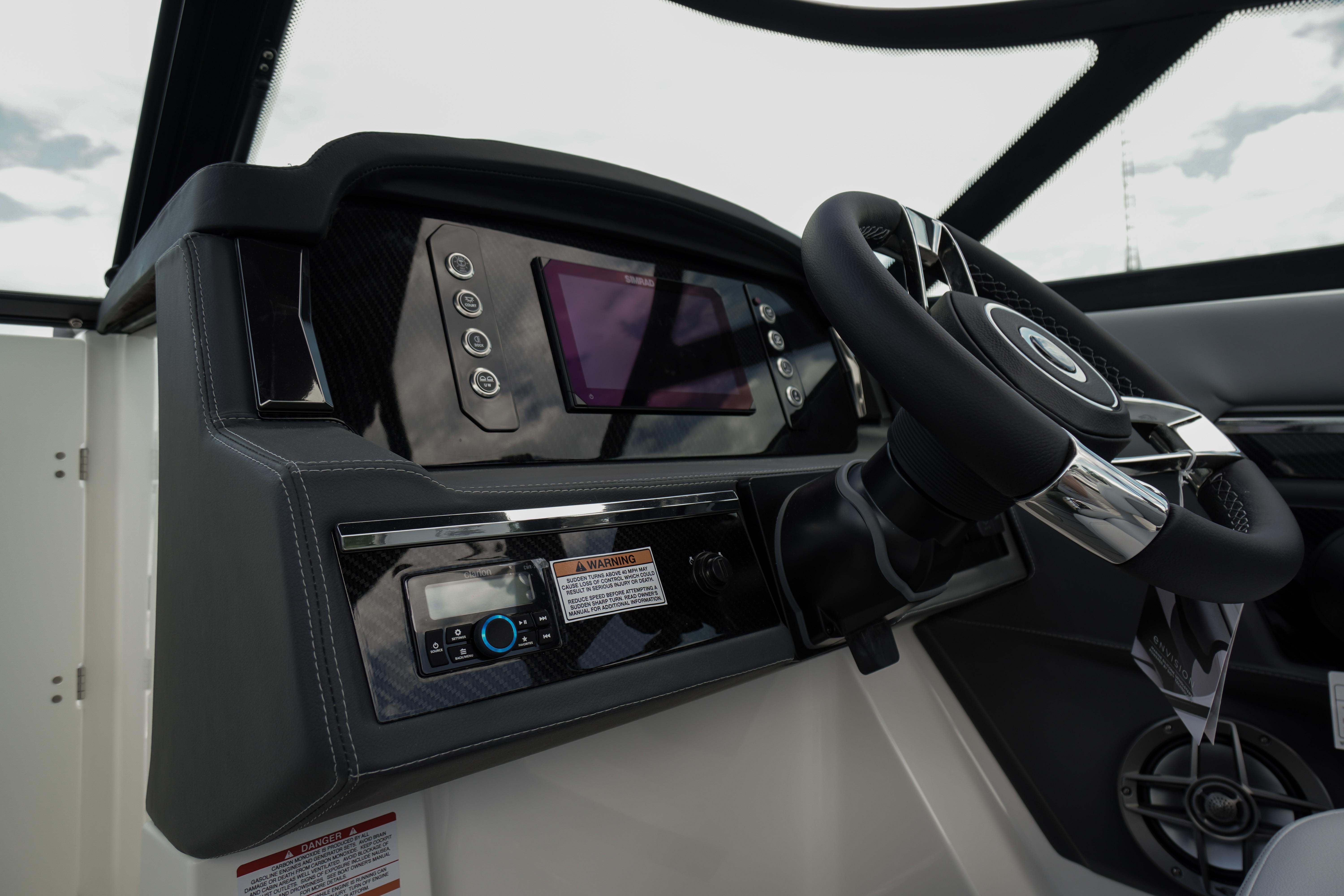 2026 Chaparral SSX 4 boat dashboard with steering wheel and control panel.