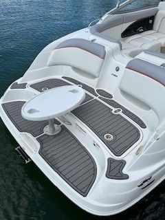 Yamaha AR230 2008 boat rear with table on water.
