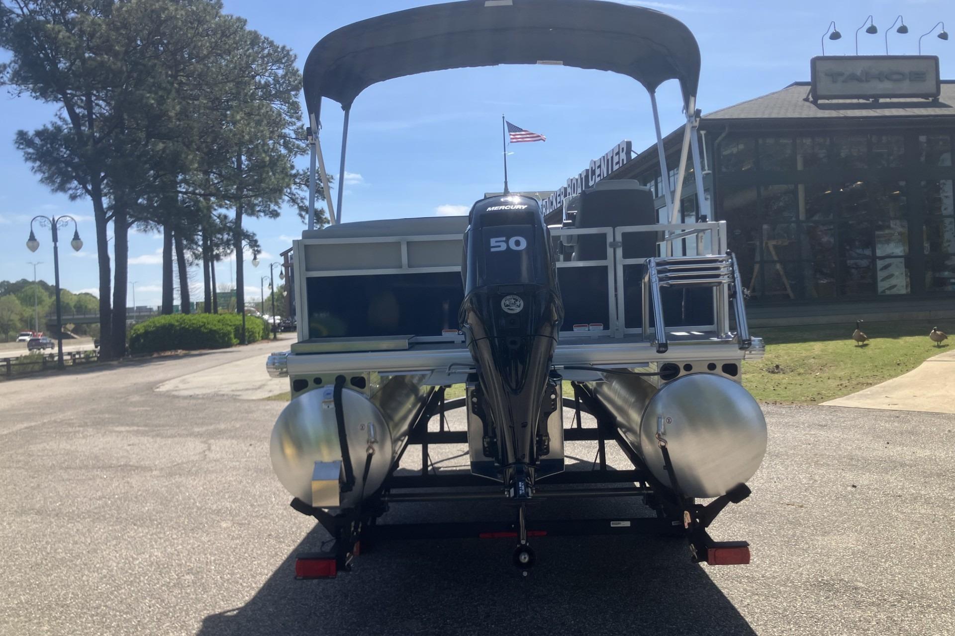 2026 Sun Tracker Bass Buggy 16 XL Select pontoon boat with Mercury 50 engine.