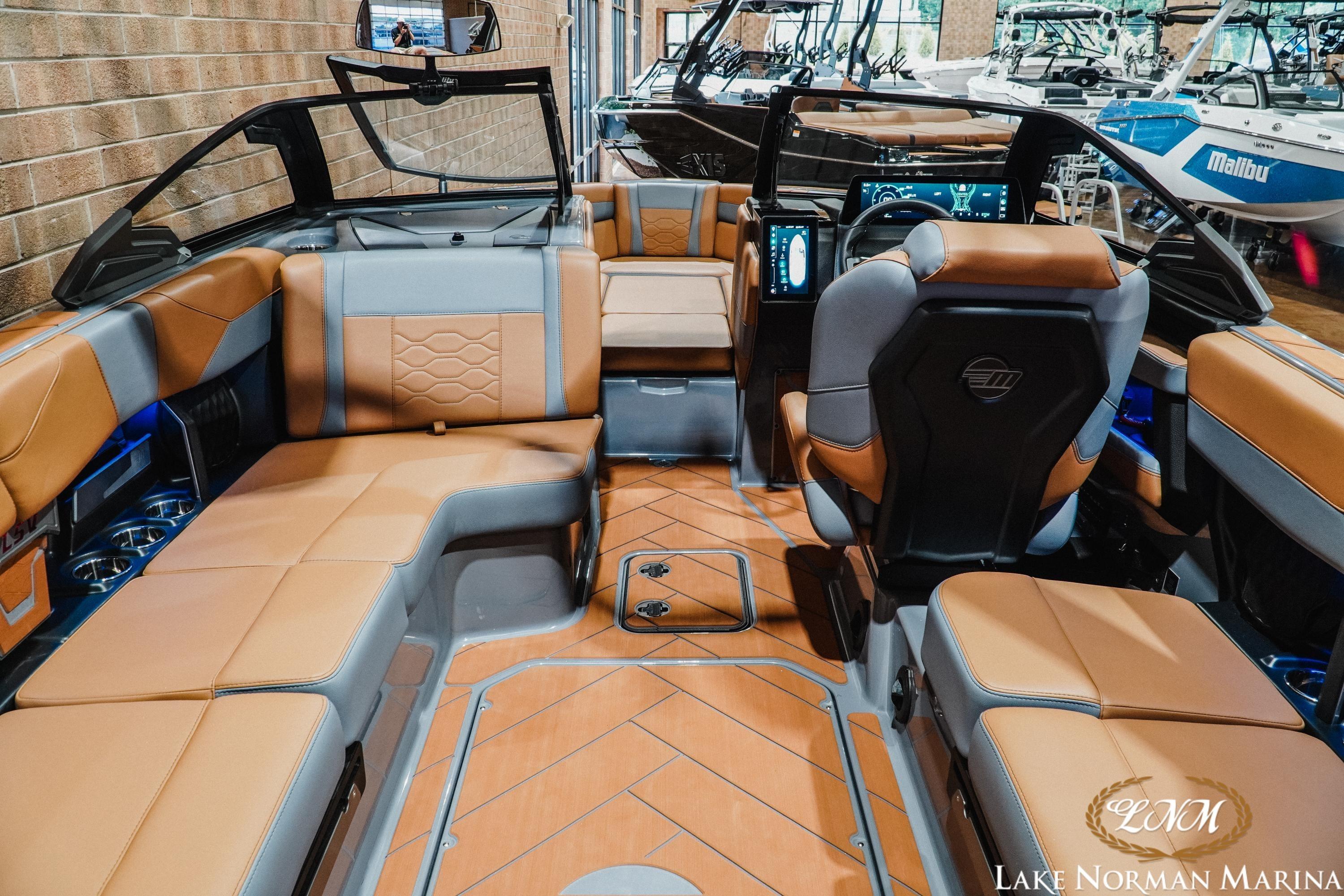 2026 Malibu Wakesetter 23 LSV interior with luxurious seating and modern dashboard at Lake Norman Marina.