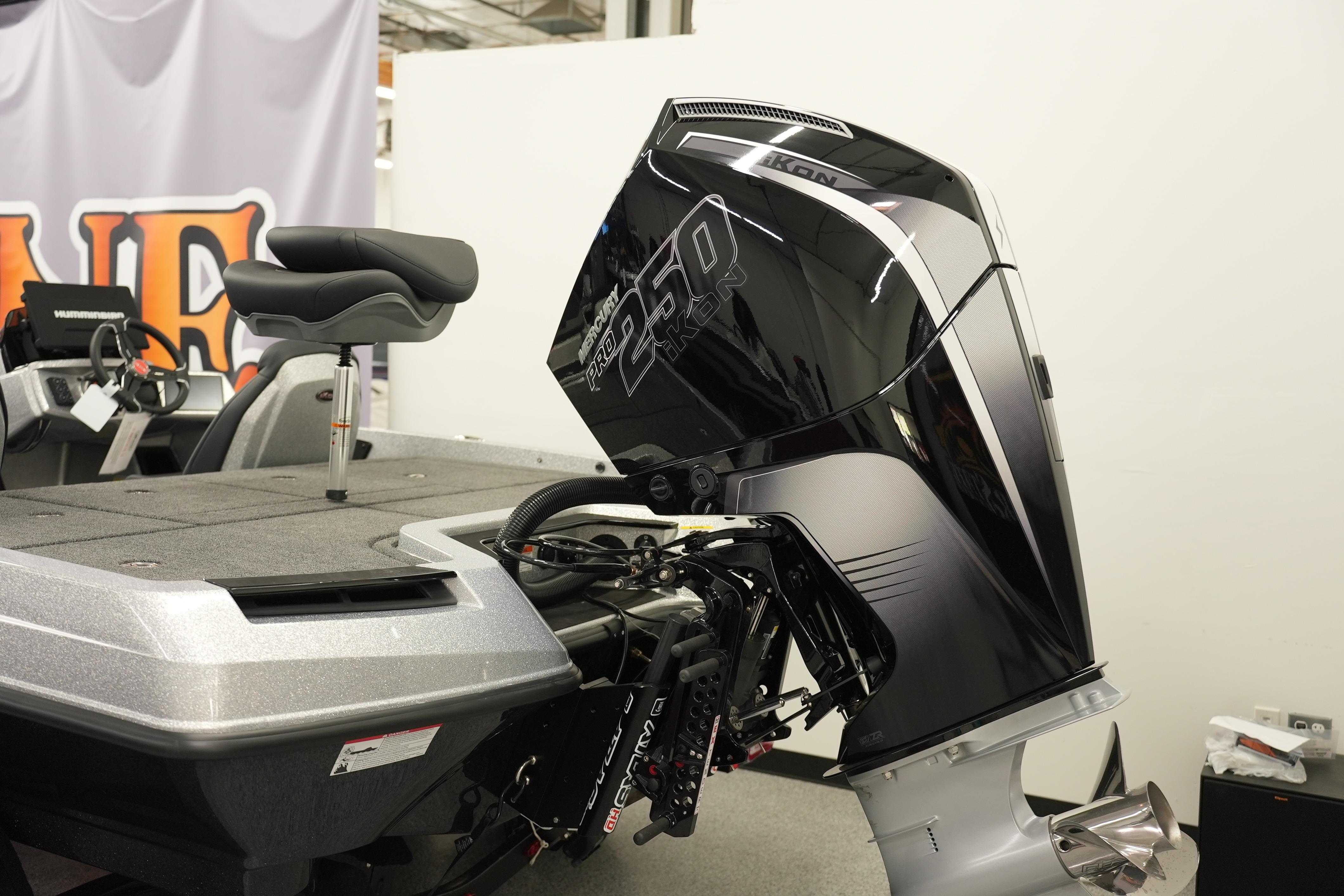 2026 iKon LXE20 boat with powerful outboard motor in showroom display.