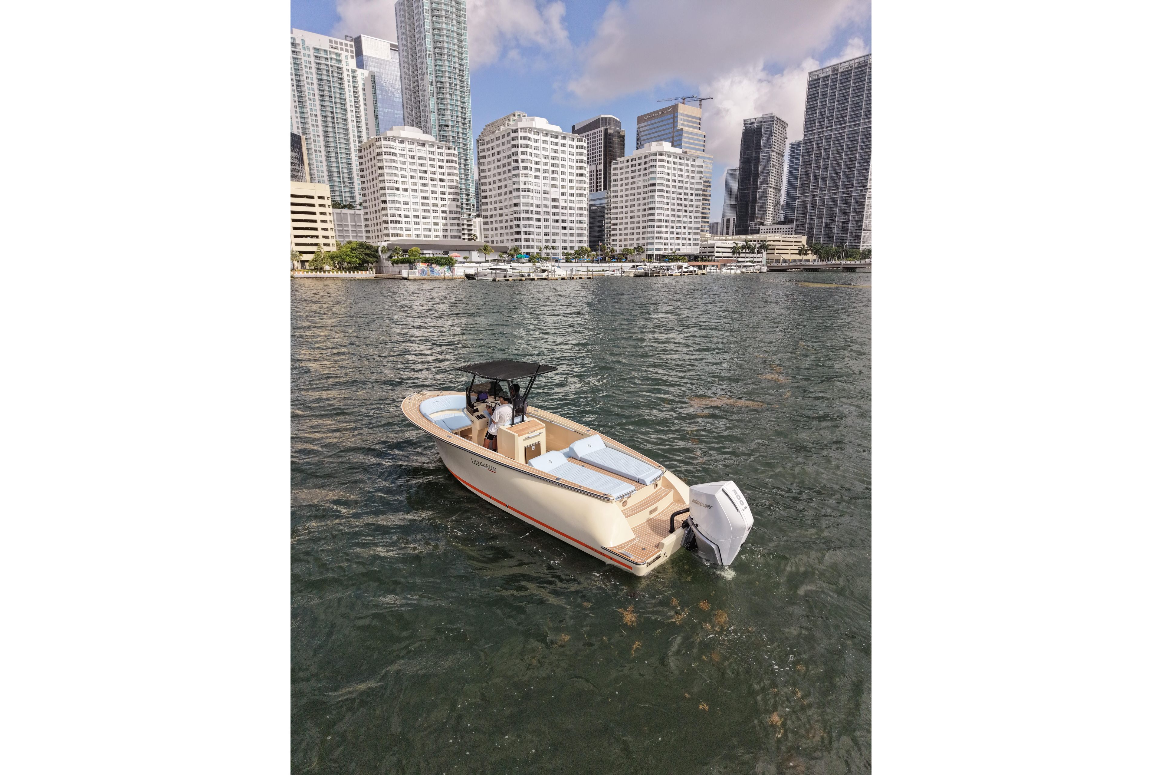2026 Lilybaeum Levanzo 25 boat on water with city skyline background.