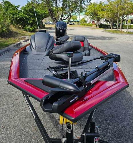 2025 Tracker Pro Team 175 boat with red trim and advanced fishing equipment.