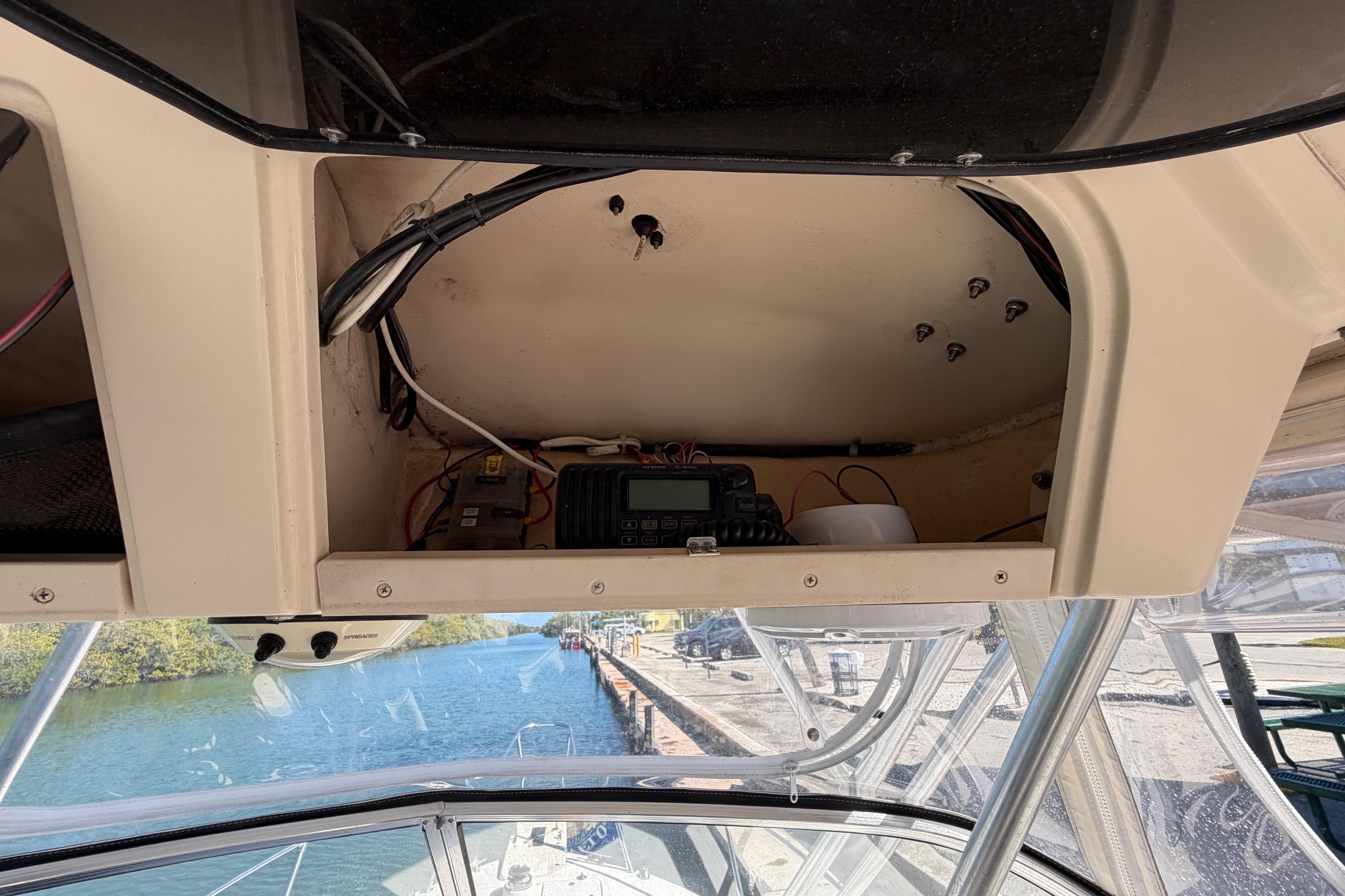 2006 Grady-White Sailfish 282 boat interior with electronic equipment and waterway view.