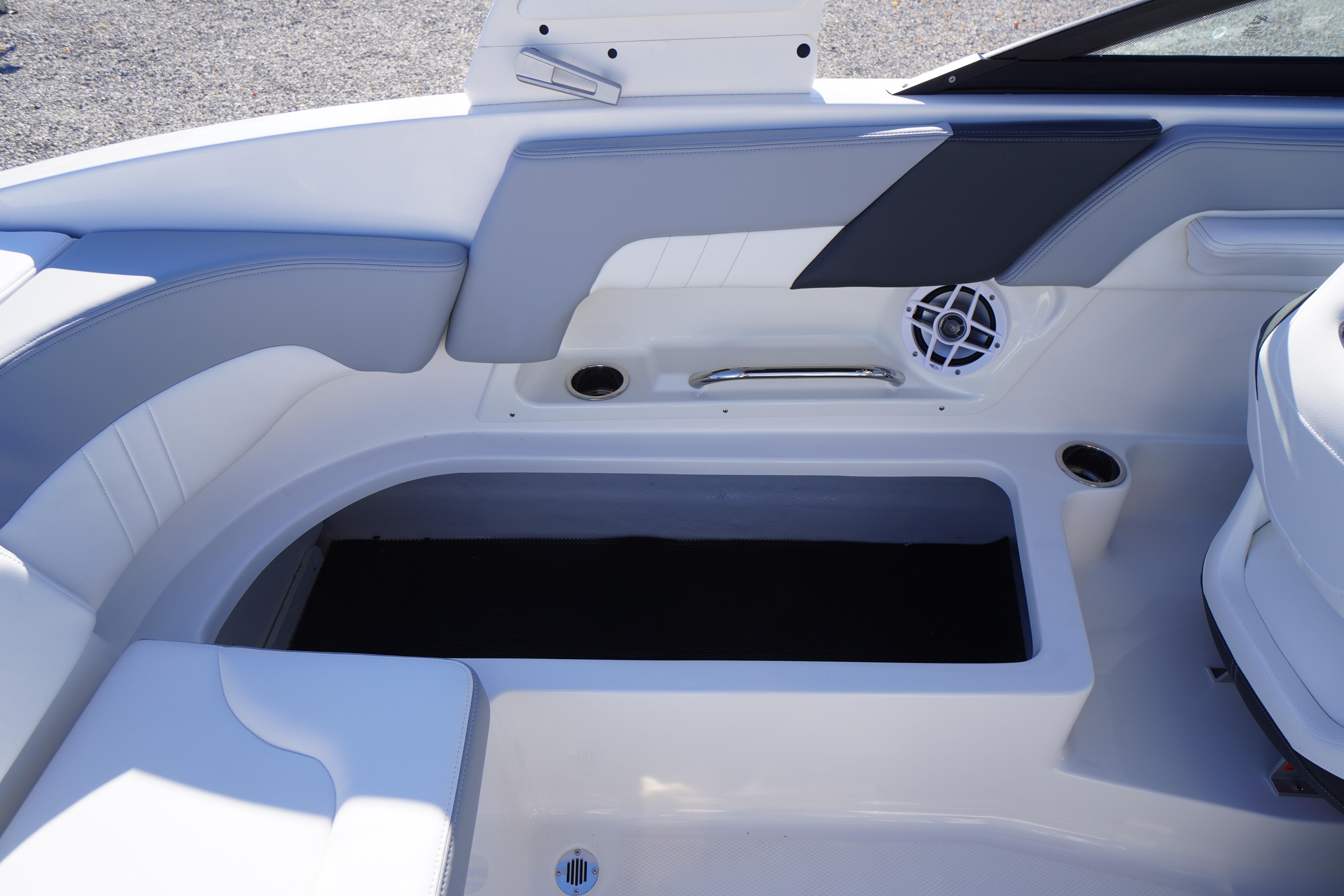 Interior of 2026 Chaparral 23 SSi boat with seating and speaker detail.