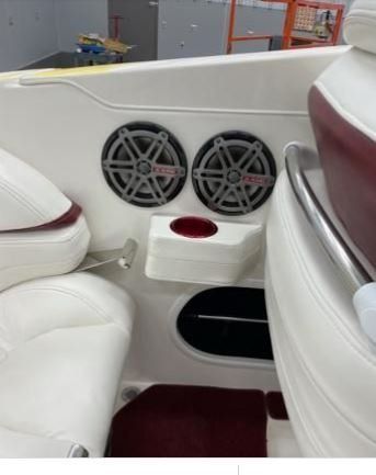 Interior of a 2003 Sunsation 32 Dominator boat with speakers.