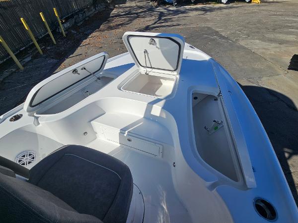 2026 Sea Hunt BX 22 BR boat interior with open storage compartments.