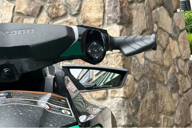 Close-up of a Sea-Doo PWC GTR 230 handlebar and mirror.