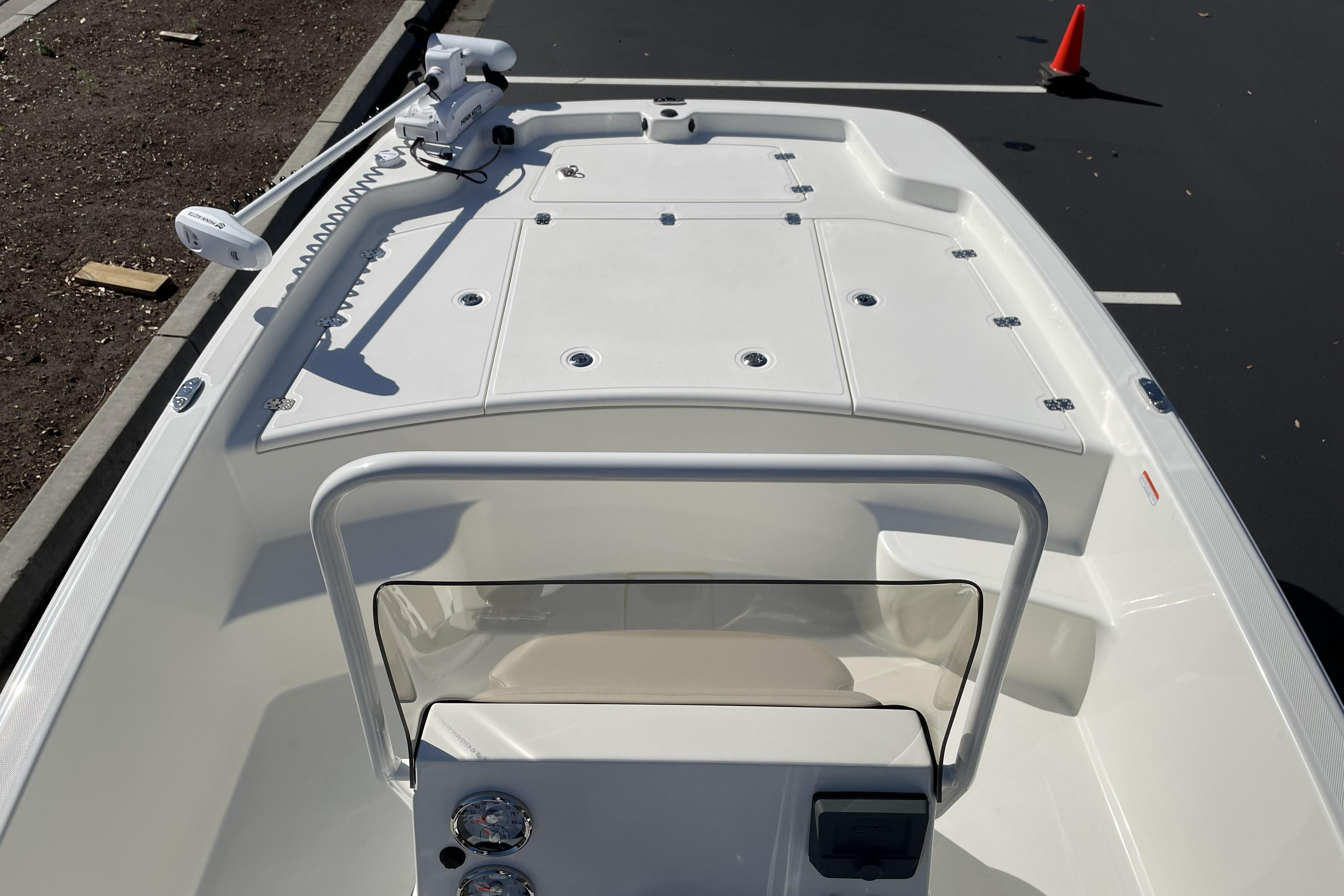 2026 Mako Pro Skiff 19 CC boat, featuring a sleek white deck and modern controls.
