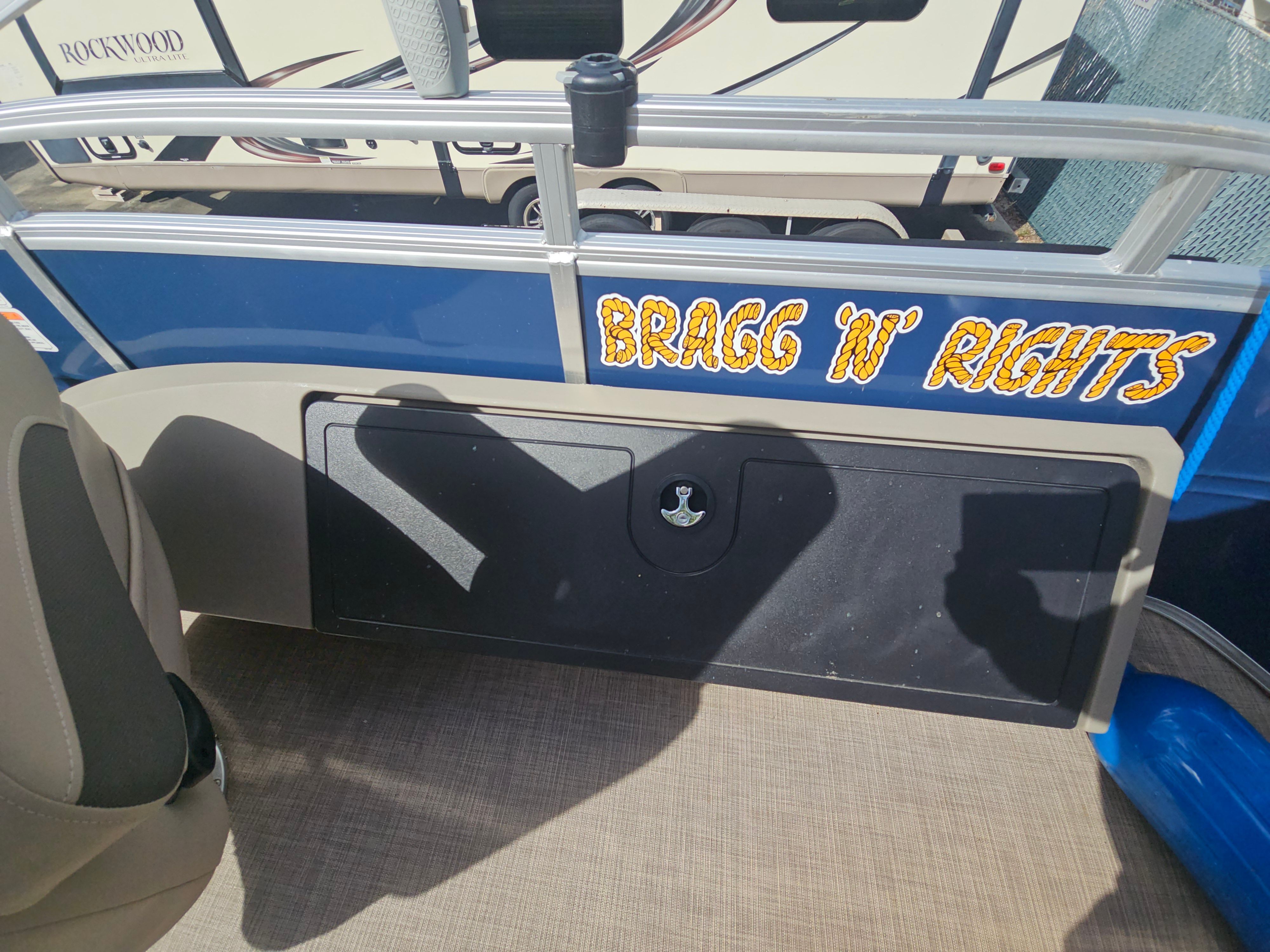 2024 Sun Tracker Fishin' Barge 22 DLX with "Bragg 'N' Rights" lettering.