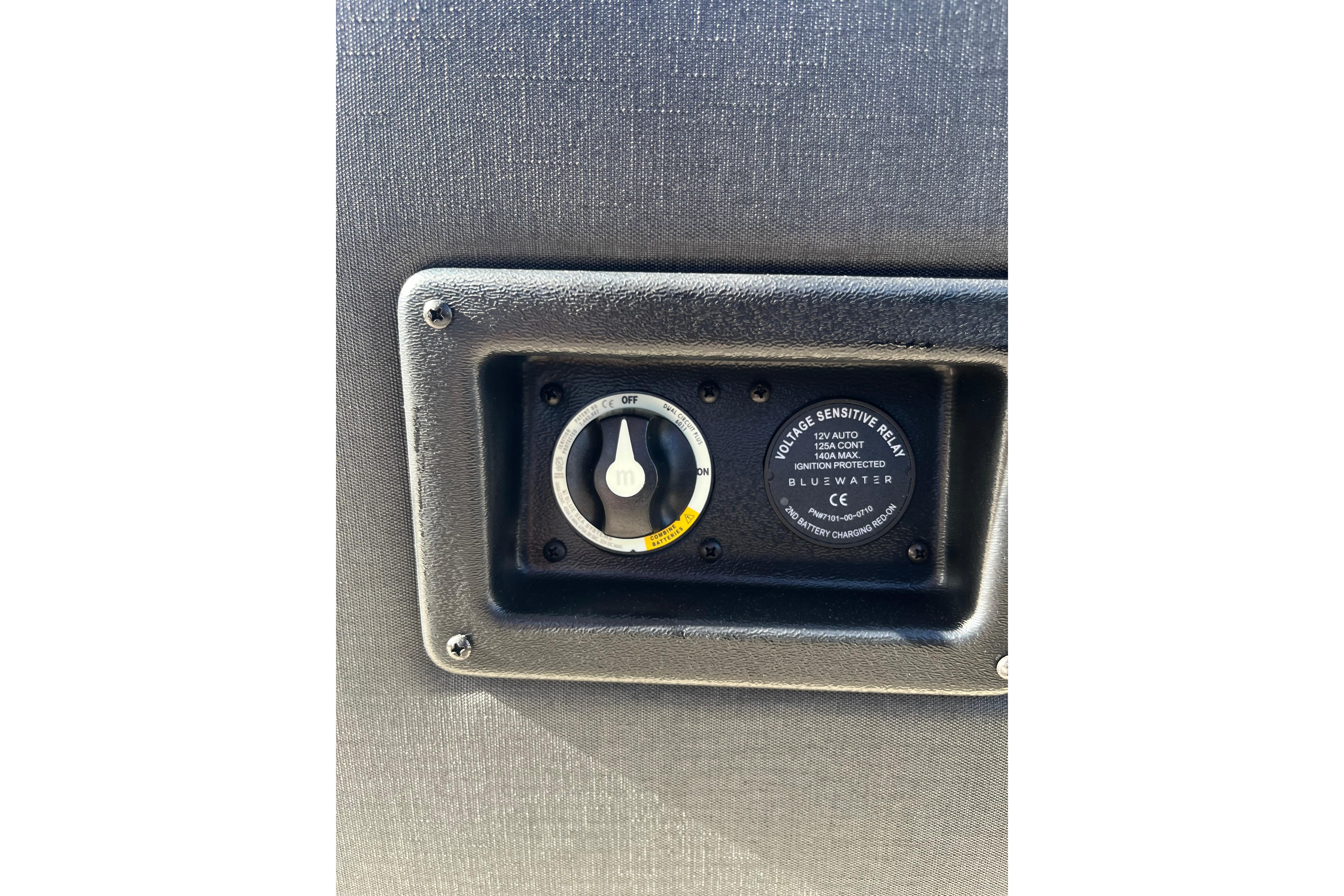 Control panel of 2026 Evotti 523CS with voltage sensitive relay and switch.