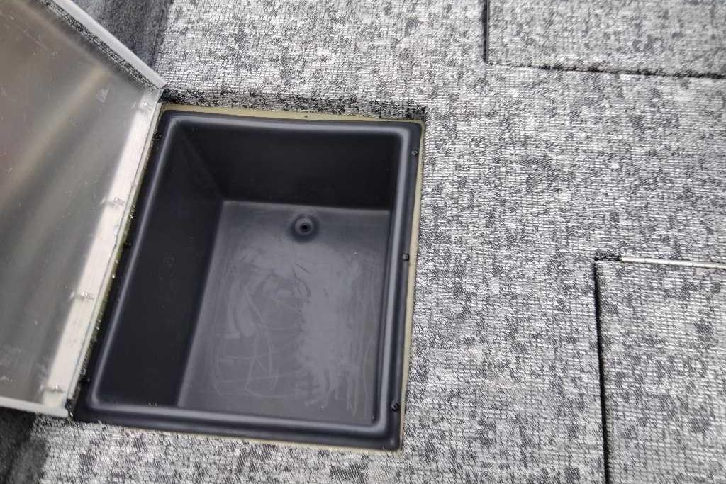Open storage compartment on 2026 Tracker Pro Team 195 boat deck.
