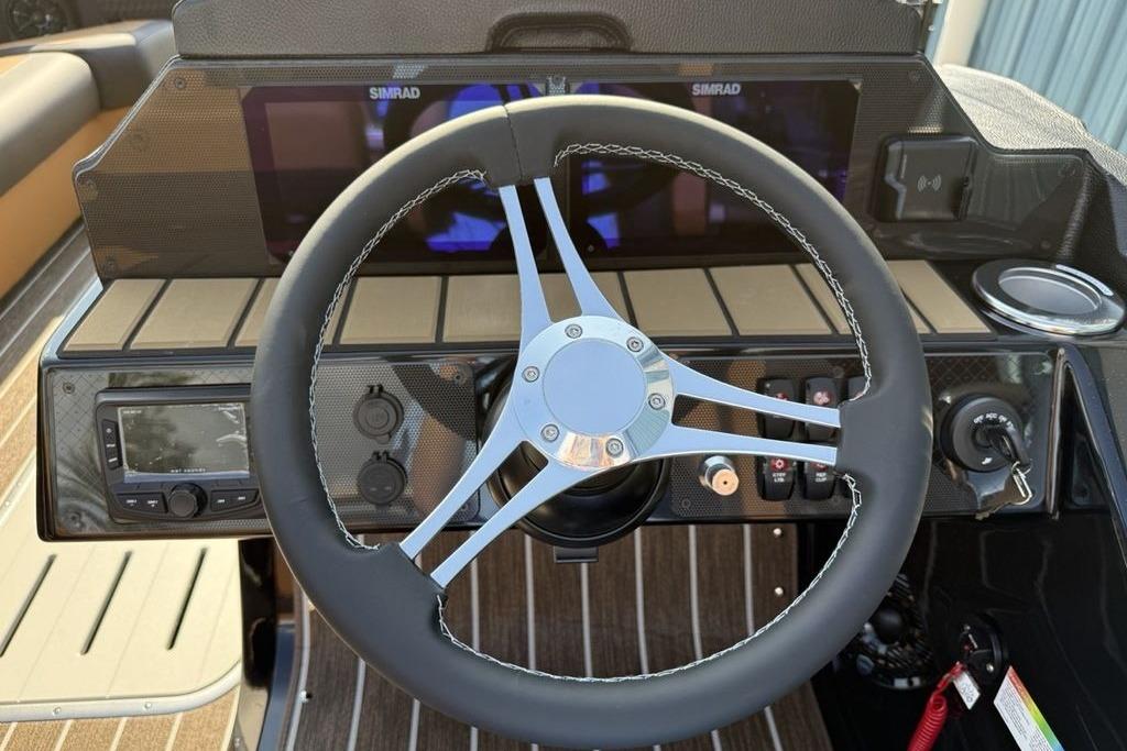 Steering wheel and dashboard of 2026 Premier 250 Solaris RS CL boat.
